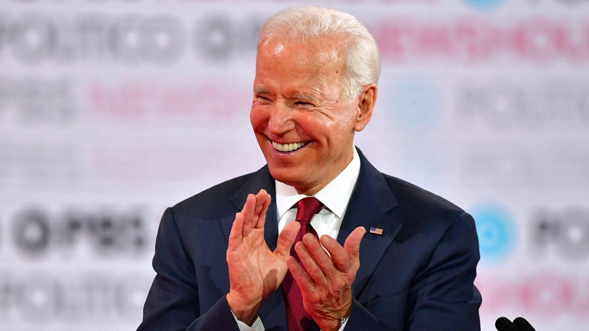 Democratic presidential hopeful former Vice President Joe Biden laughs during the sixth Democratic primary debate of the 2020 presidential campaign season co-hosted by PBS NewsHour &amp; Politico at Loyola Marymount University in Los Angeles, California on December 19, 2019.