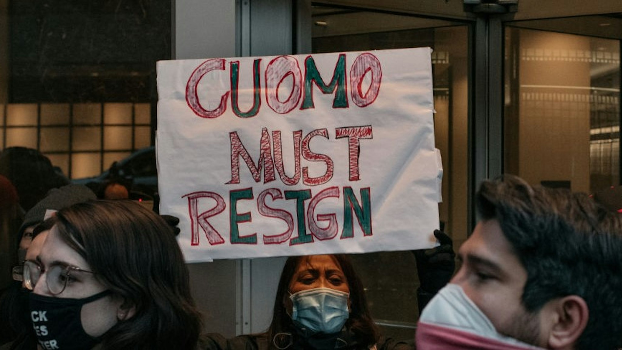 NEW YORK, NY - MARCH 02: Demonstrators call on New York Gov. Andrew Cuomo to resign at a rally on March 2, 2021 in New York City. Calls for Cuomo's impeachment or resignation have escalated in the wake of multiple women coming forward to accuse the governor of sexual harassment. (Photo by