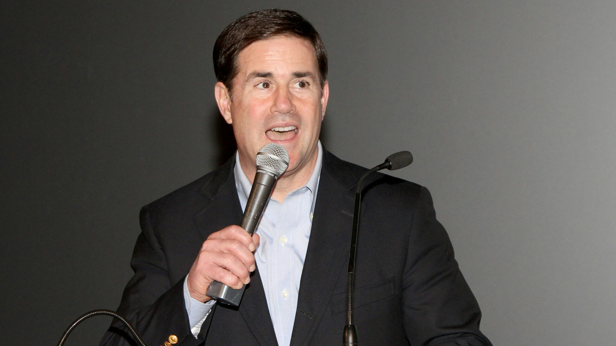 PHOENIX, AZ - JANUARY 31: Arizona Governor Doug Ducey speaks at the 28th Annual Leigh Steinberg Super Bowl Party at Arizona Science Center on January 31, 2015 in Phoenix, Arizona.