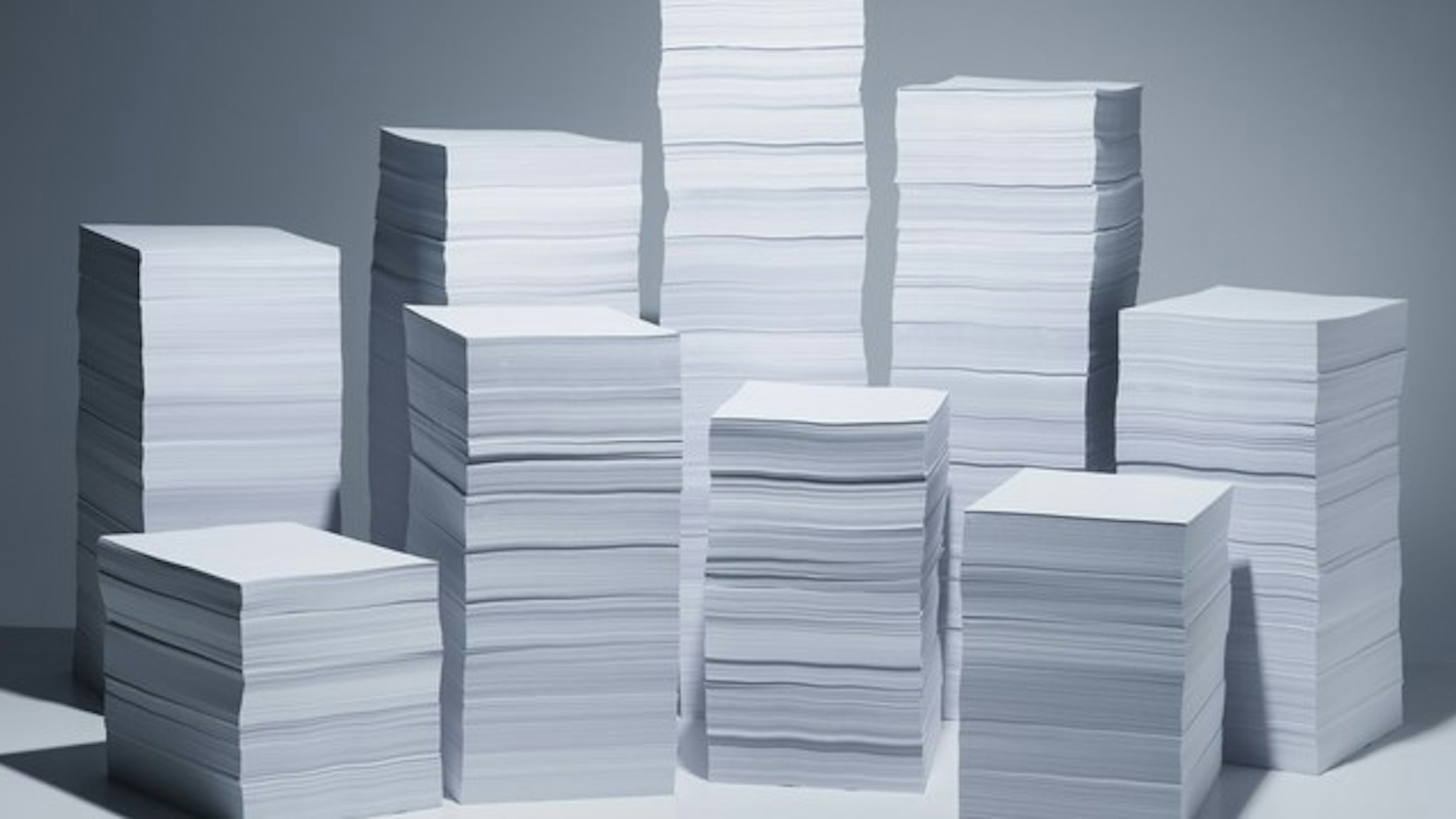 45,000 sheets of paper stacked into nine piles