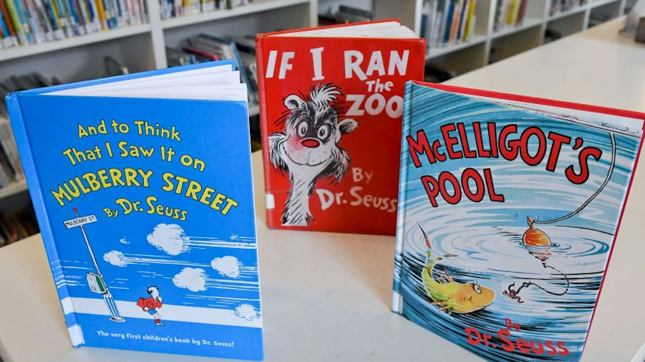 Wyomissing, PA - March 4: Copies of "And to Think That I Saw It on Mulberry Street", "If I Ran the Zoo", and "McElligot's Pool", three of the books by Dr. Suess that will no longer be published. At the Wyomissing Public Library in Wyomissing Thursday afternoon March 4, 2021. Six books by children's book author Dr. Suess will no longer be published because they "portray people in ways that are hurtful and wrong". (Photo by