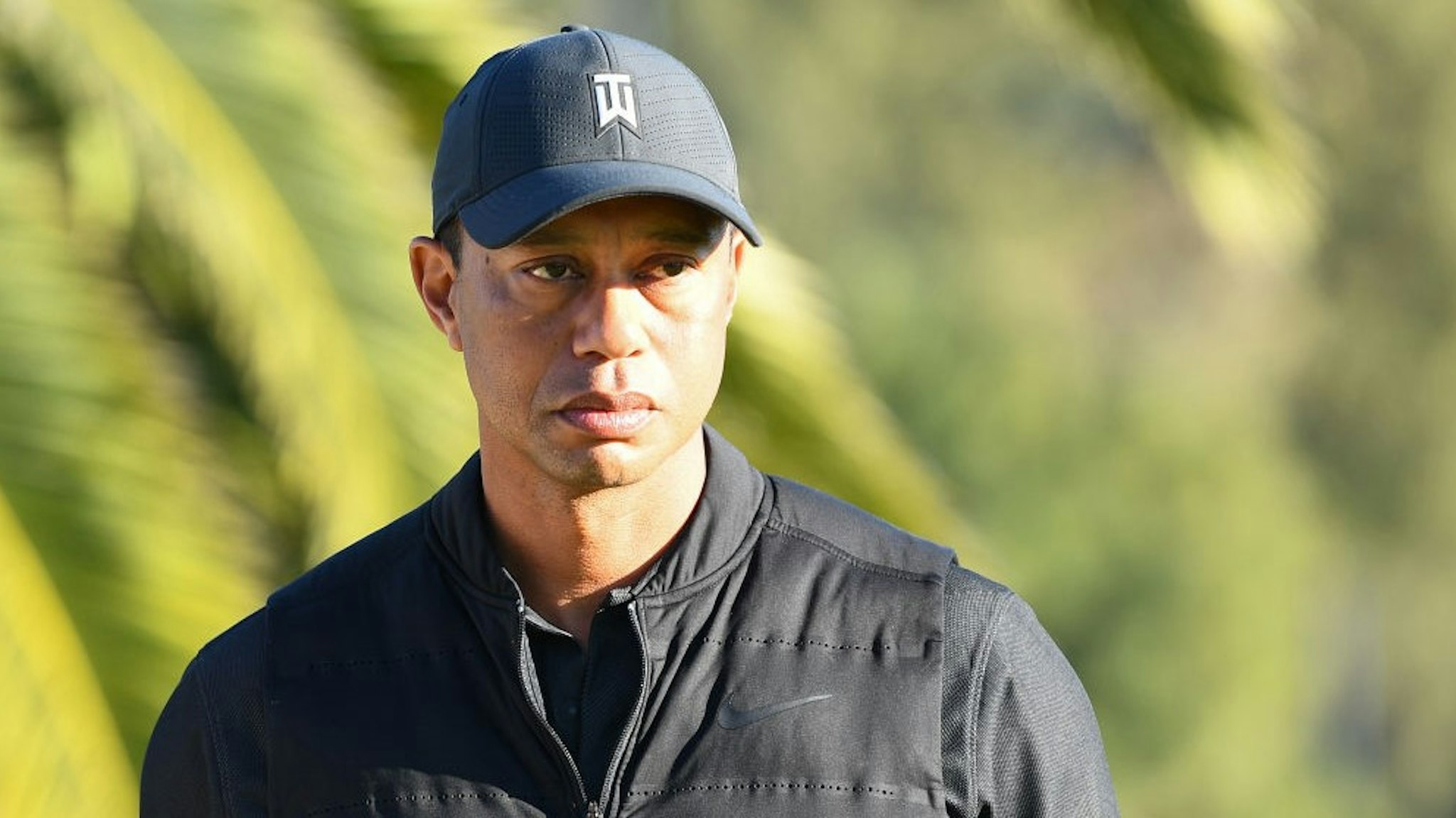 PACIFIC PALISADES, CA - FEBRUARY 21: Tiger Woods looks on from the 18th hole during the final round of The Genesis Invitational golf tournament at the Riviera Country Club in Pacific Palisades, CA on February 21, 2021. The tournament was played without fans due to the COVID-19 pandemic.(Photo by