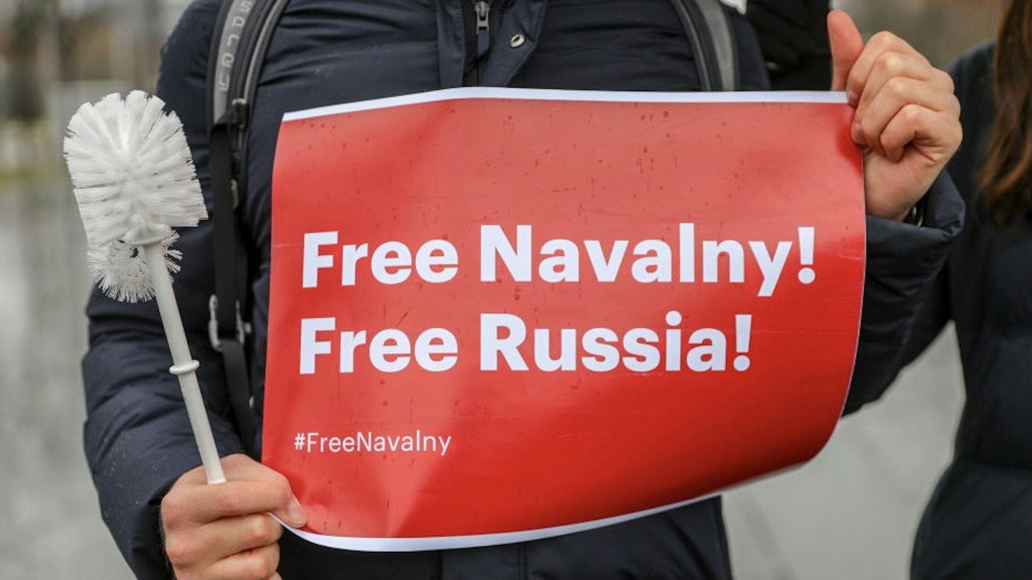 BERLIN, GERMANY - JANUARY 23: Some 2500 supporters of Russian opposition politician Alexei Navalny marched in protest demand for his release from prison in Moscow on January 23, 2021 in Berlin, Germany. The protesters marched from the federal chancellery through the Russian embassy to Brandenburg Gate in part also heeding a call by Navalny to protest against Russian President Vladimir Putin. Navalny, who was arrested earlier this week upon his return to Moscow from Germany, has called for protests against Putin across Russia, though Russian authorities have refused to allow them and deemed the protests illegal. Berlin is home to a large expatriate Russian community. (Photo by Omer Messinger/Getty Images)