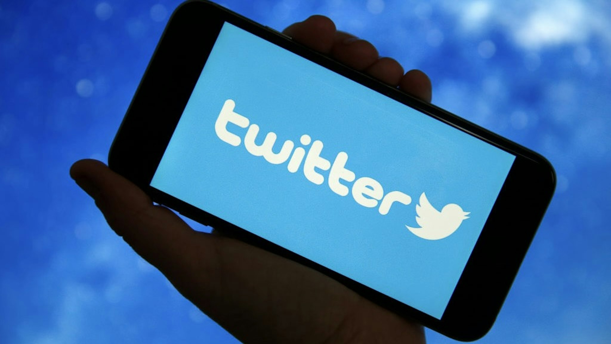 PARIS, FRANCE - DECEMBER 26: In this photo illustration, the microblogging social network Twitter logo is displayed on the screen of a smartphone on December 26, 2019 in Paris, France. A cybersecurity specialist has successfully downloaded lists of phone numbers using the contact upload feature on Twitter. No less than 2 billion telephone numbers have been recovered. The hacker then linked the numbers to user accounts, ultimately obtaining 17 million matches. For two months, his efforts allowed him to obtain information on people in Israel, Turkey, Iran, Greece, Armenia, France and Germany. (Photo by Chesnot/Getty Images)