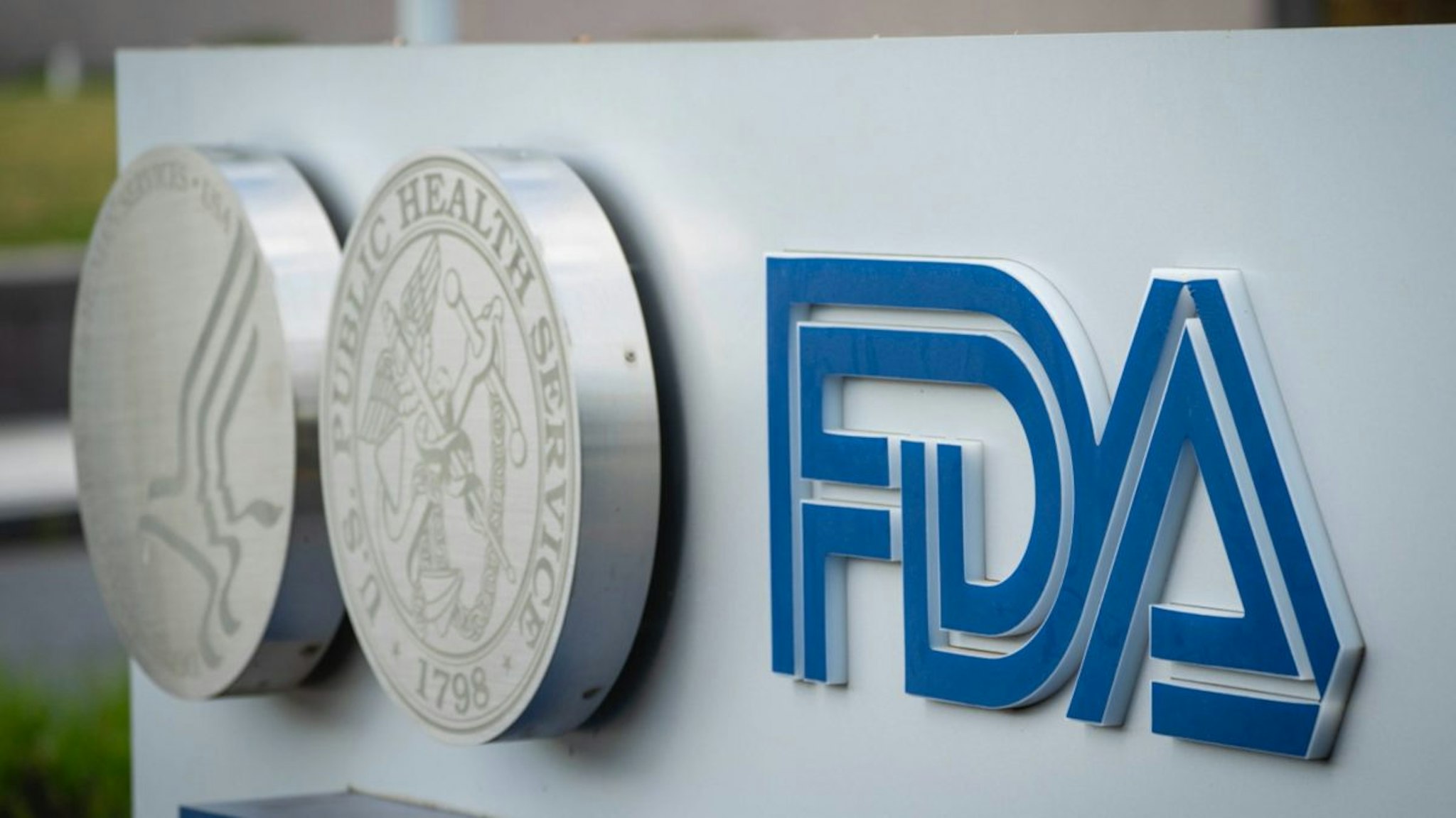 A sign for the Food And Drug Administration is seen outside of the headquarters on July 20, 2020 in White Oak, Maryland.