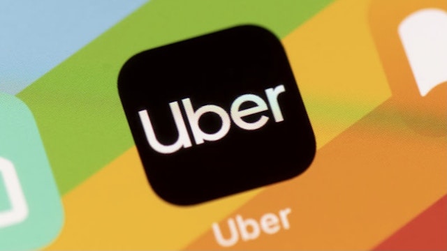 CARDIFF, WALES - FEBRUARY 19: In this photo illustration a close-up of an Uber app is seen on an iPhone on February 19, 2021 in Cardiff, Wales. Uber drivers in the UK have won a six-year battle to be recognised as workers by the taxi firm and not self-employed. This could mean they are now entitled to the minimum wage and paid holiday. (Photo illustration by Matthew Horwood/Getty Images)
