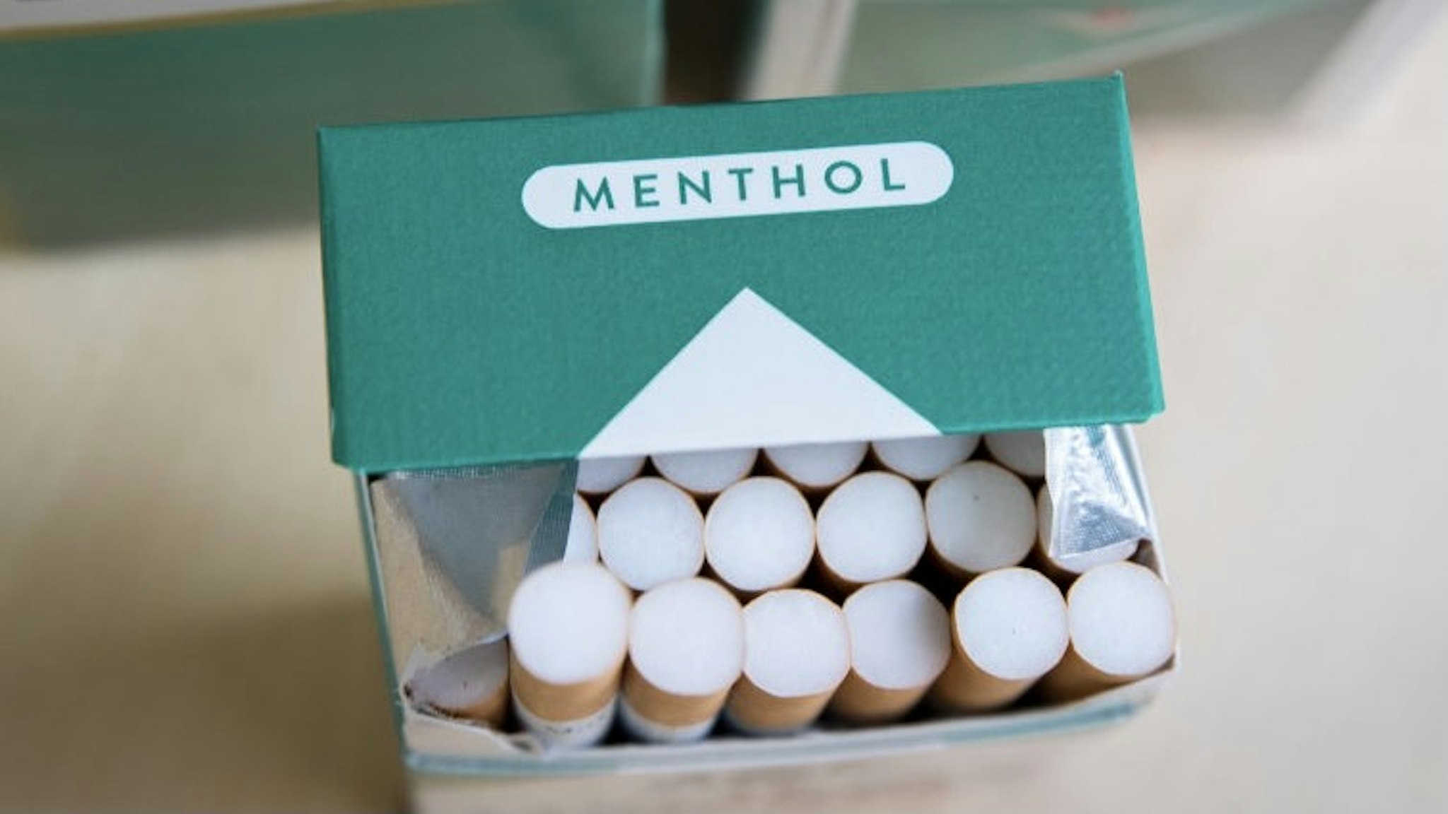 FDA Moves To Ban Menthol Cigarettes And Flavored Cigars NEW YORK, NEW YORK - NOVEMBER 15: In this photo illustration, packs of menthol cigarettes sits on a table, November 15, 2018 in New York City. The U.S.Food and Drug Administration is proposing a ban on the sale of menthol cigarettes and flavored cigars. Menthol cigarettes make up 35 percent of U.S. cigarette sales. (Photo Illustration by Drew Angerer/Getty Images)