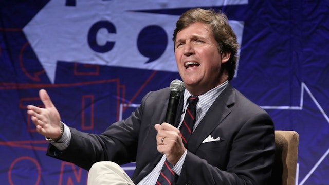 LOS ANGELES, CA - OCTOBER 21: Tucker Carlson speaks onstage during Politicon 2018 at Los Angeles Convention Center on October 21, 2018 in Los Angeles, California. (Photo by Phillip Faraone/Getty Images for Politicon )