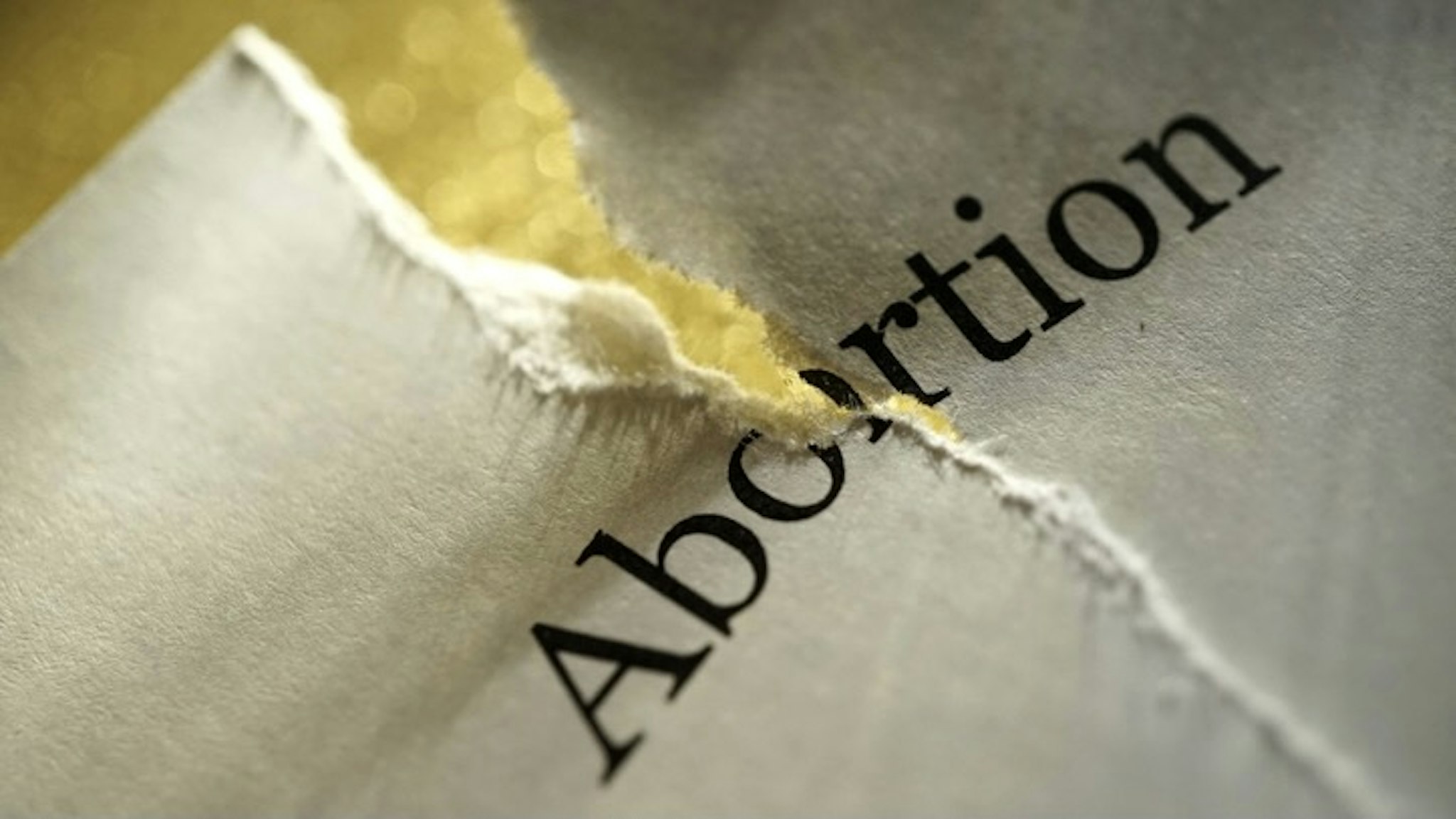 pro life - stock photo shot of torn paper