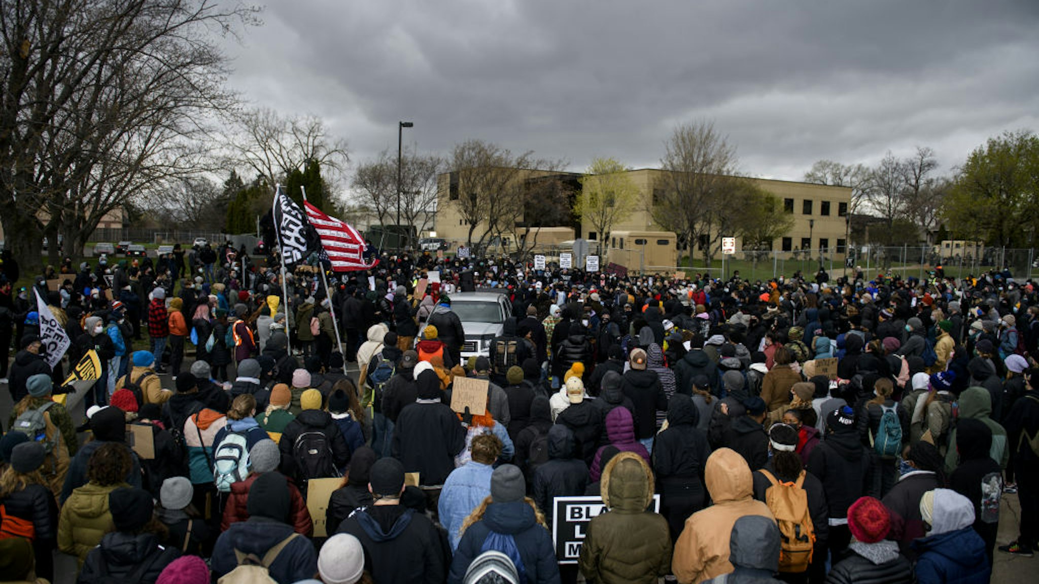BROOKLYN CENTER, MN - APRIL 13: Protesters gather outside the Brooklyn Center police headquarters on April 13, 2021 in Brooklyn Center, Minnesota. Demonstrations have become a daily occurrence since Daunte Wright, 20, was shot and killed by Brooklyn Center police officer Kimberly Potter on Sunday.