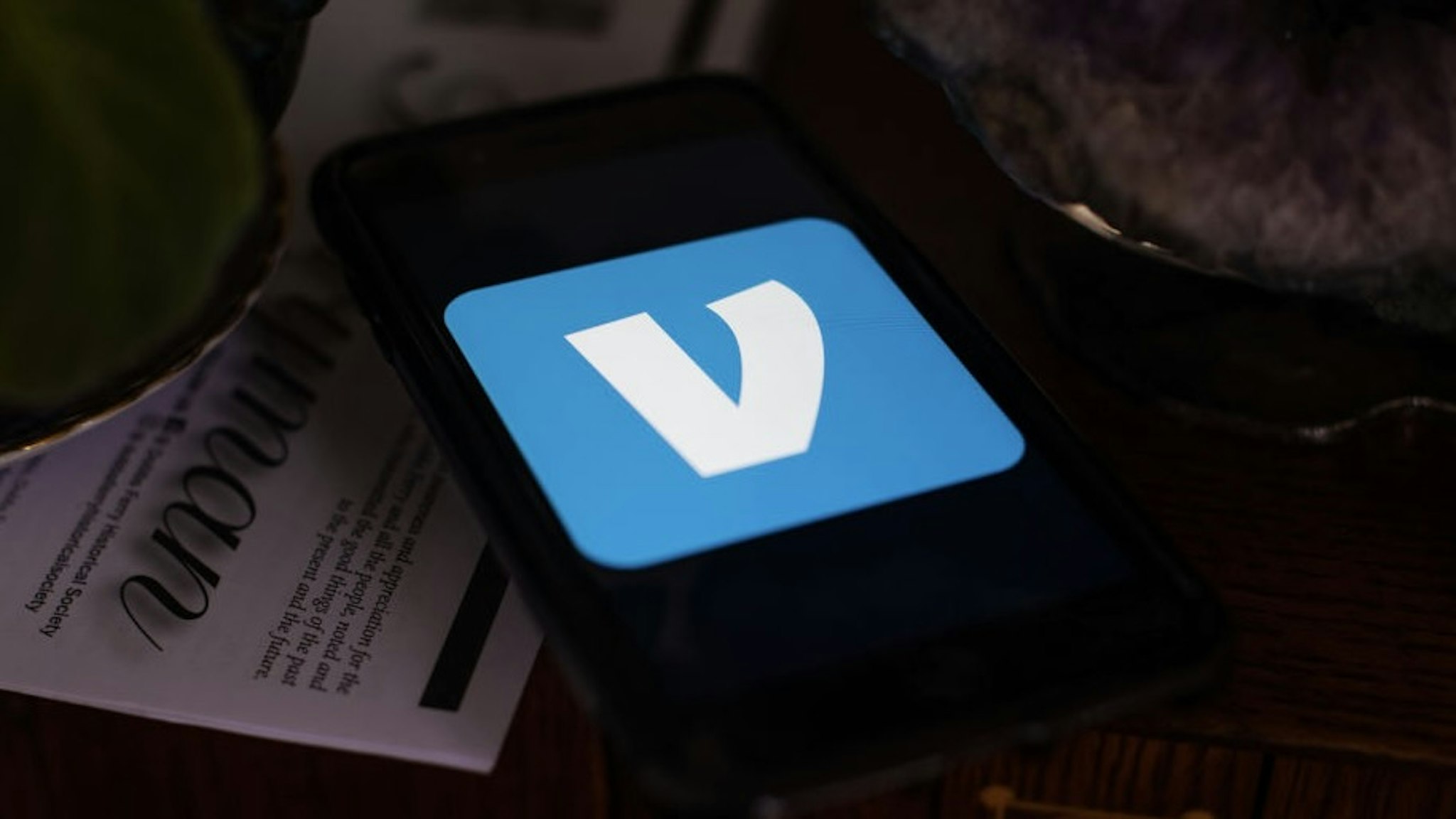The Venmo logo on a mobile phone arranged in Dobbs Ferry, New York, U.S., on Saturday, Feb. 13, 2021. PayPal Holdings Inc. demonstrated new versions of PayPal and Venmo wallets that are rolling out in the second quarter. Photographer: Tiffany Hagler-Geard/Bloomberg