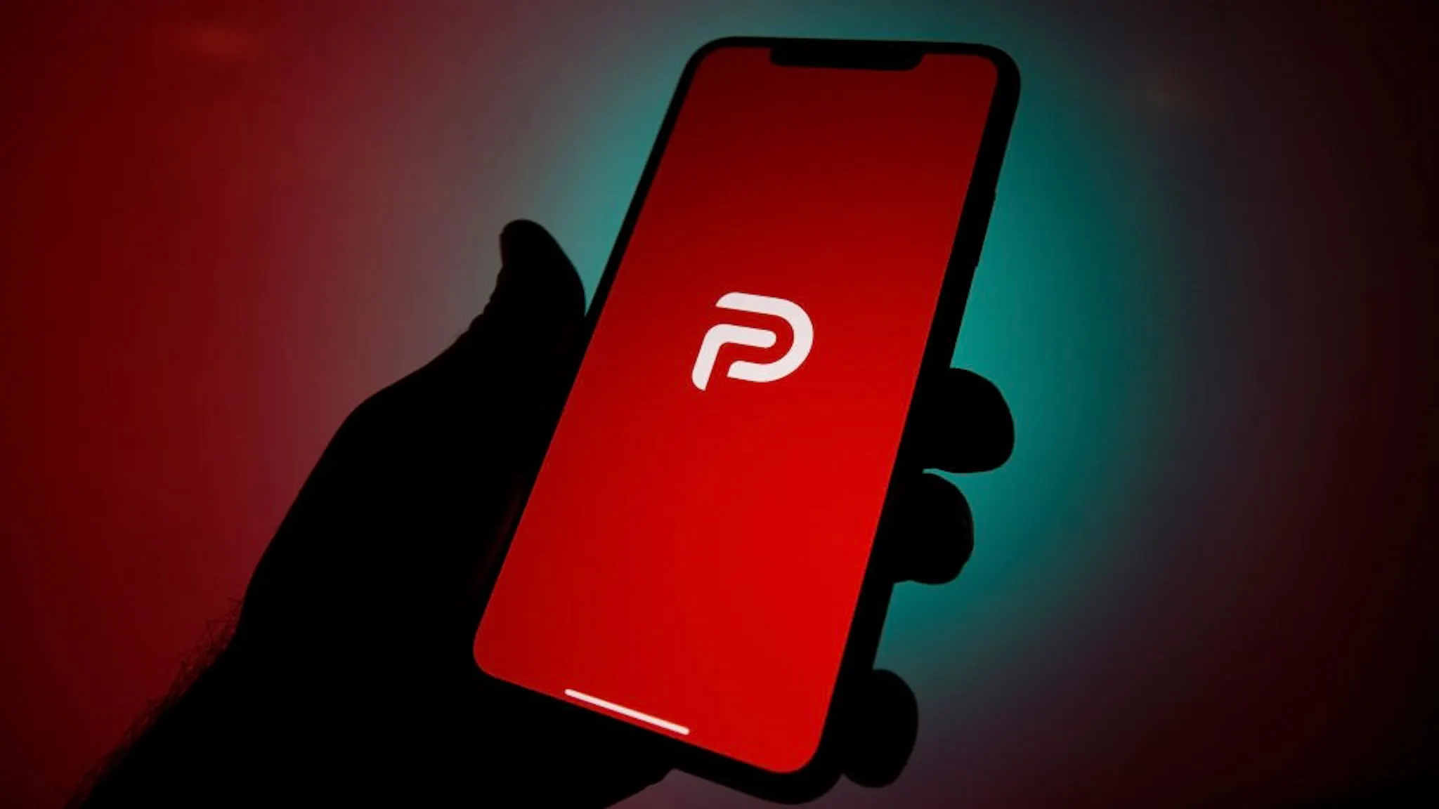 CCF74817-3B5E-4B79-BB4B-E768F2D4AA1A_1_201_a The Parler logo is seen on an Apple iPhone in this photo illustration in Warsaw, Poland on January 10, 2021. The Parler app, developed as an alternative social media platform for conservatives has been taken from the Apple App Store and the Google Play store. Supporters of Donald Trump including many who stormed the Capitol on Wednesday communicate via the app. The app has been removed from stores for containing a large number of posts that encourge and incite violence. Aamazon Web Services (AWS) has also announced it is no longer hosting the platform on it's cloud services. (Photo by Jaap Arriens/NurPhoto)