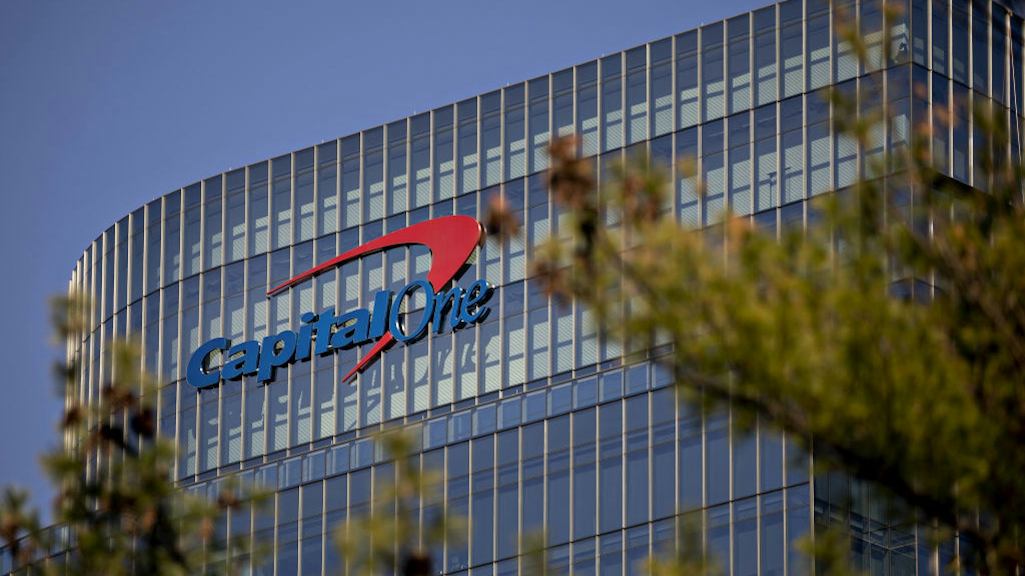 Signage is displayed at Capital One Financial Corp. headquarters in McLean, Virginia, U.S., on Wednesday, Nov. 6, 2019. Capital One's July 29 disclosure of a data breach exposed the company to regulatory fines and lawsuits, which could cost more than $200 million according to Bloomberg Intelligence.