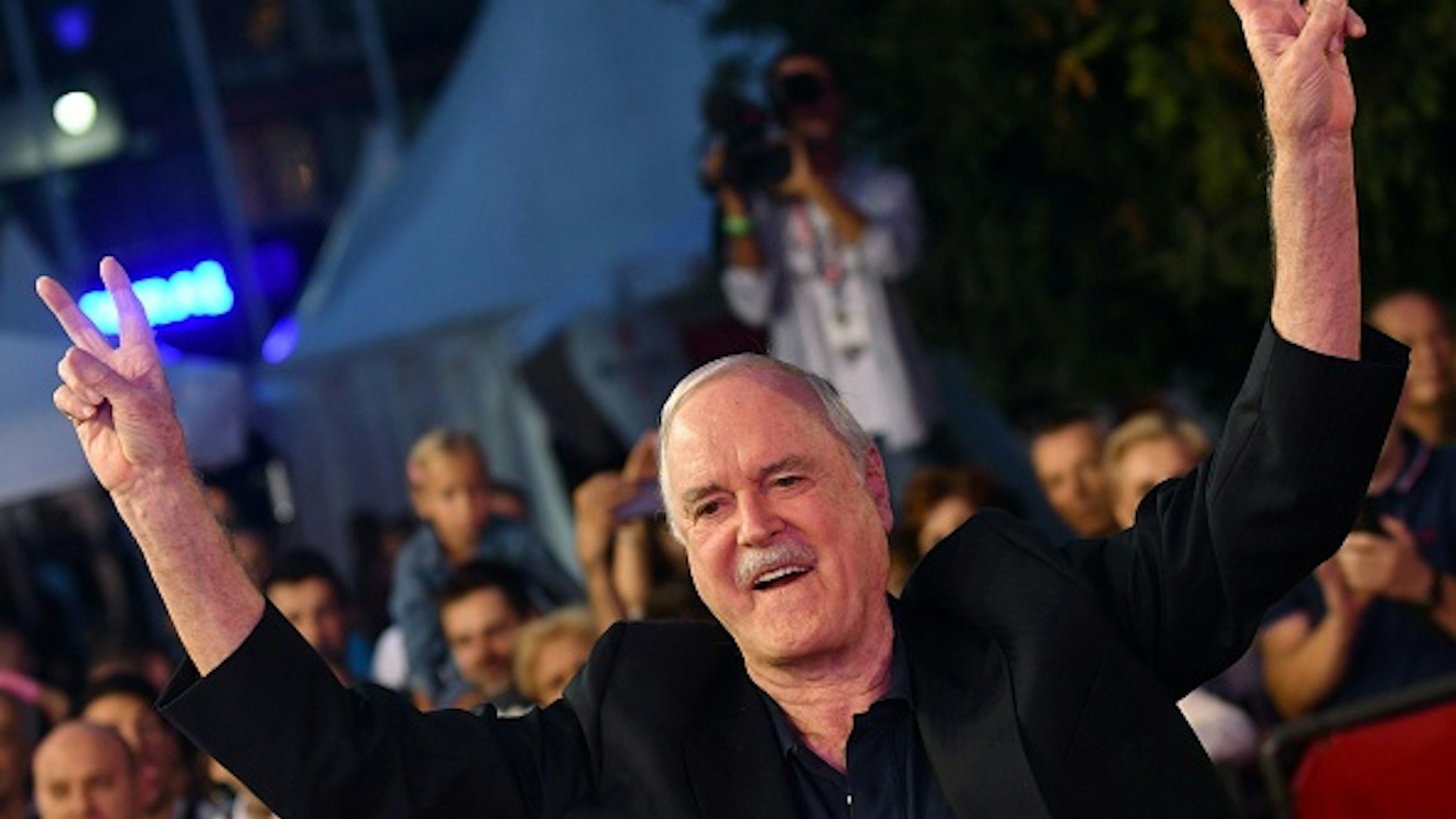 British actor John Cleese arrives for the 23rd Sarajevo Film Festival late on August 16, 2017, where he is to receive the 'Honorary Heart Of Sarajevo' award for his "extraordinary contribution" to film. / AFP PHOTO / ELVIS BARUKCIC
