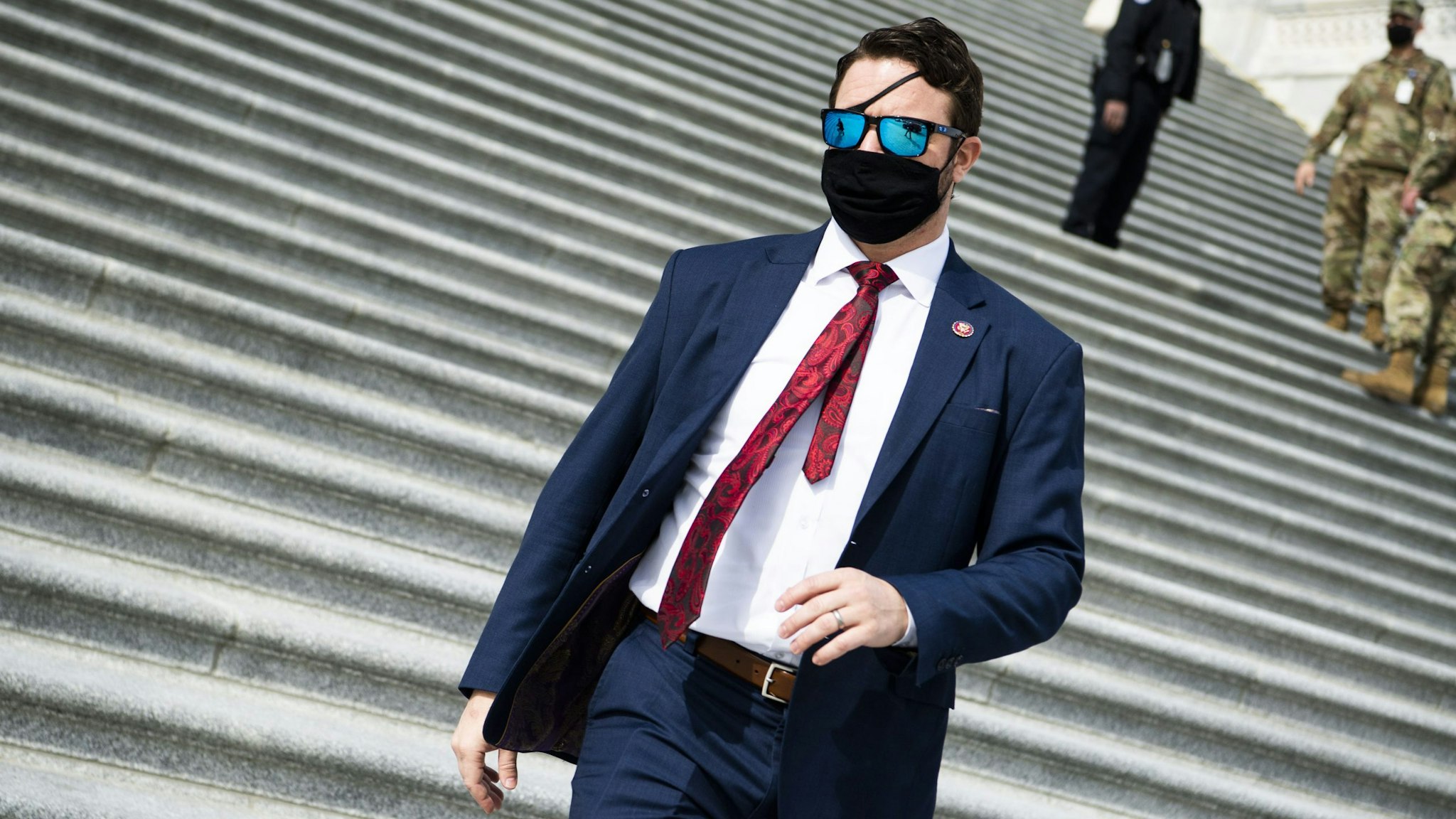UNITED STATES - FEBRUARY 26: Rep. Dan Crenshaw, R-Texas, is seen outside the Capitol during a vote on the Protecting America's Wilderness and Public Lands Act, on Friday, February 26, 2021.