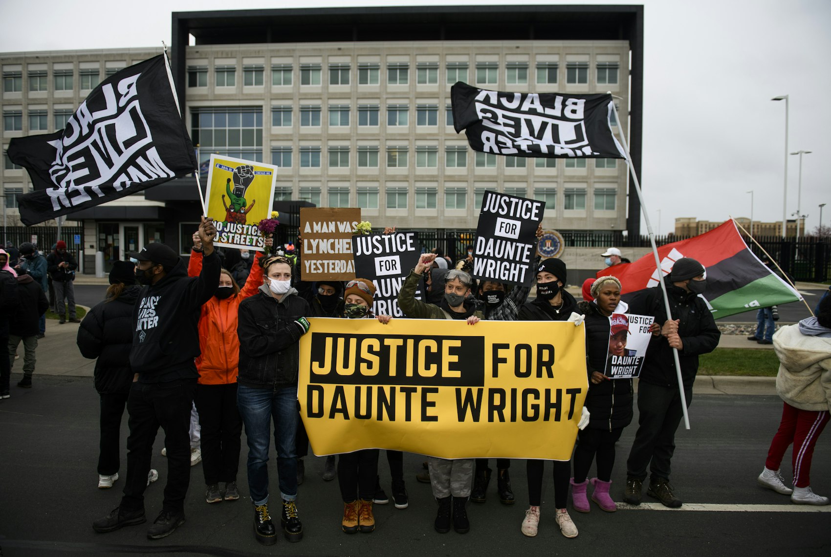 BROOKLYN CENTER, MN - APRIL 13: Protesters march from the Brooklyn Center police headquarters to a nearby FBI office on April 13, 2021 in Brooklyn Center, Minnesota. Demonstrations have become a daily occurrence since Daunte Wright, 20, was shot and killed by Brooklyn Center police officer Kimberly Potter on Sunday. Photo by Stephen Maturen/Getty Images)