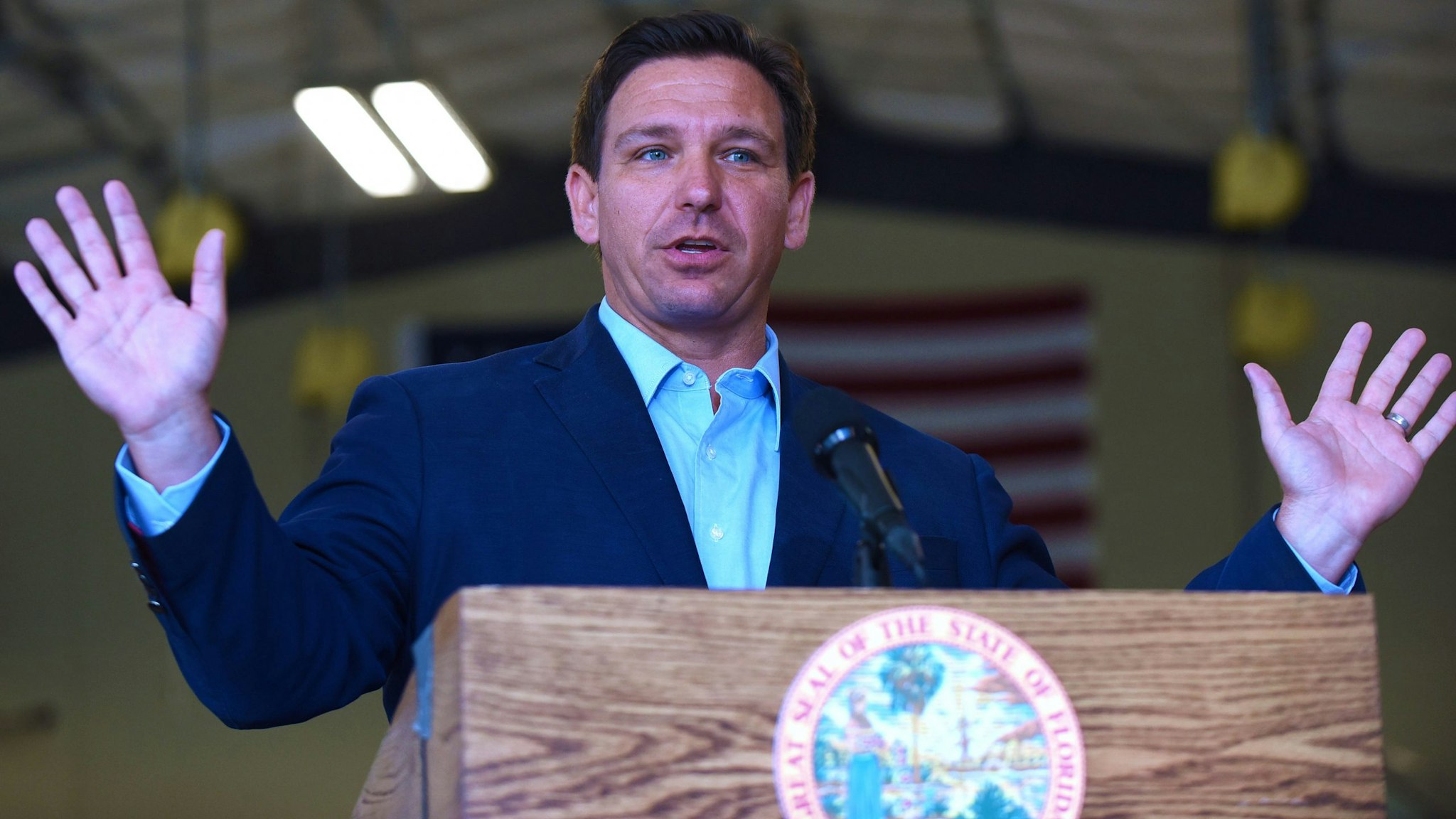 MELBOURNE, FLORIDA, UNITED STATES - 2021/03/22: Florida Governor, Ron DeSantis speaks at a press conference at the Eau Gallie High School aviation hangar. DeSantis announced he is asking the legislature for $75 million of federal funds to support what hes dubbed the Get There Faster initiative, aimed at boosting access to technical education programs for both high school students and adult learners.
