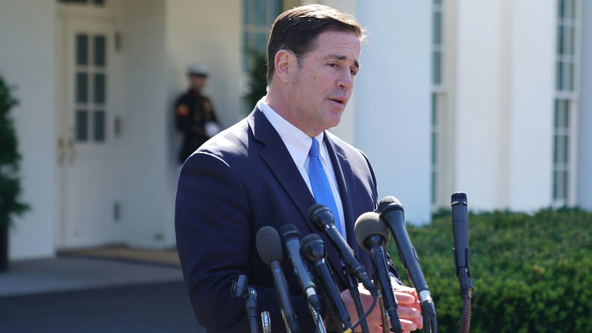 WASHINGTON, DC - APRIL 03: Arizona Governor Doug Ducey talks to reporters after meeting with President Donald Trump at the White House April 03, 2019 in Washington, DC. Ducey said he spoke with Trump about security along the Arizona-Mexico border and called on Congress to "stop playing political games and act."