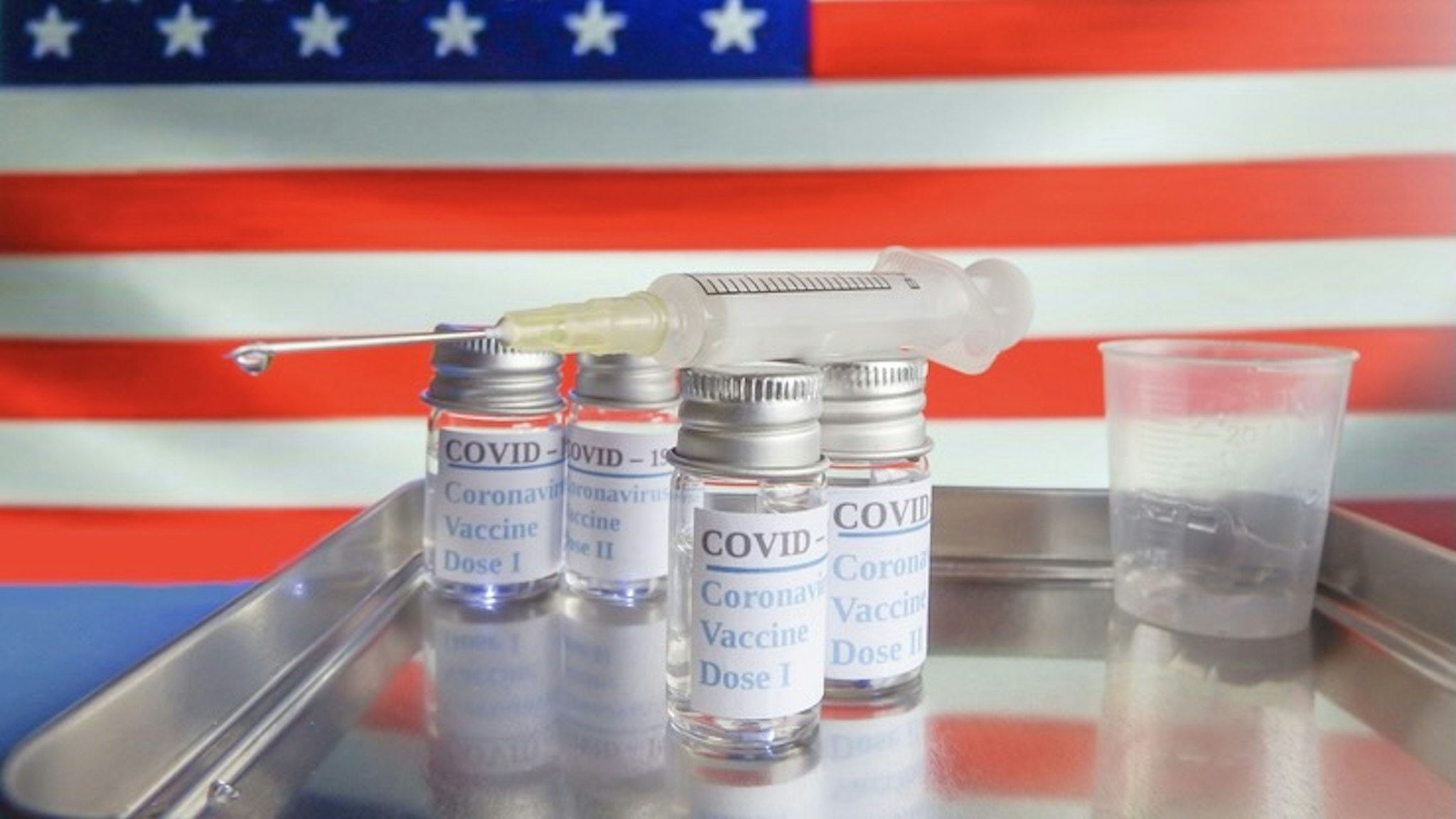 Covid 19 vaccine - stock photo Covid 19 vaccine and United States flag