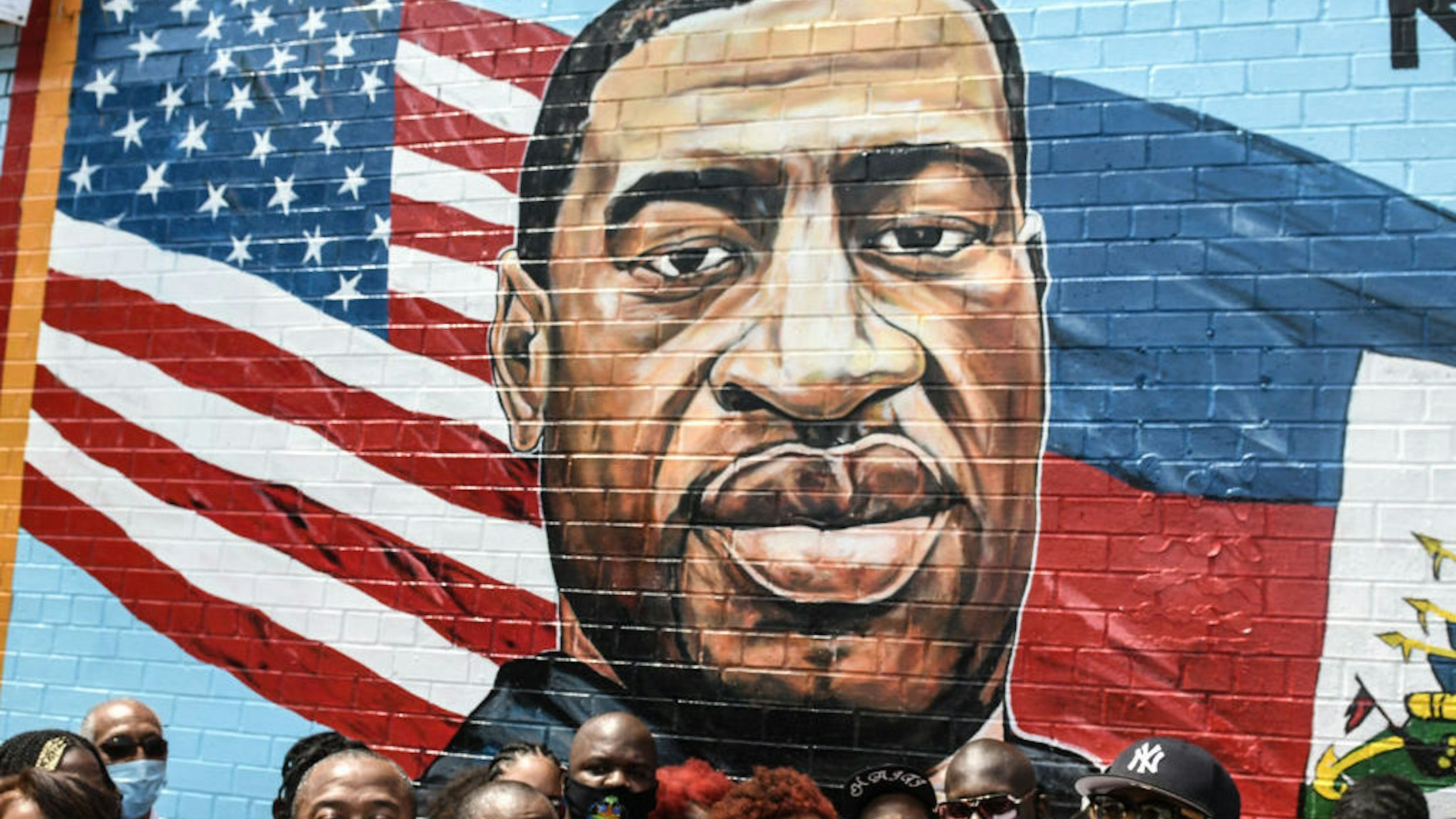 NEW YORK, NY - JULY 13: Terrance Floyd (R), the brother of George Floyd, attends a unveiling of a mural painted by artist Kenny Altidor depicting George Floyd on a sidewall of CTown Supermarket on July 13, 2020 in the Brooklyn borough New York City. George Floyd was killed by a white police officer in Minneapolis and his death has sparked a national reckoning about race and policing in the United States. (Photo by Stephanie Keith/Getty Images)