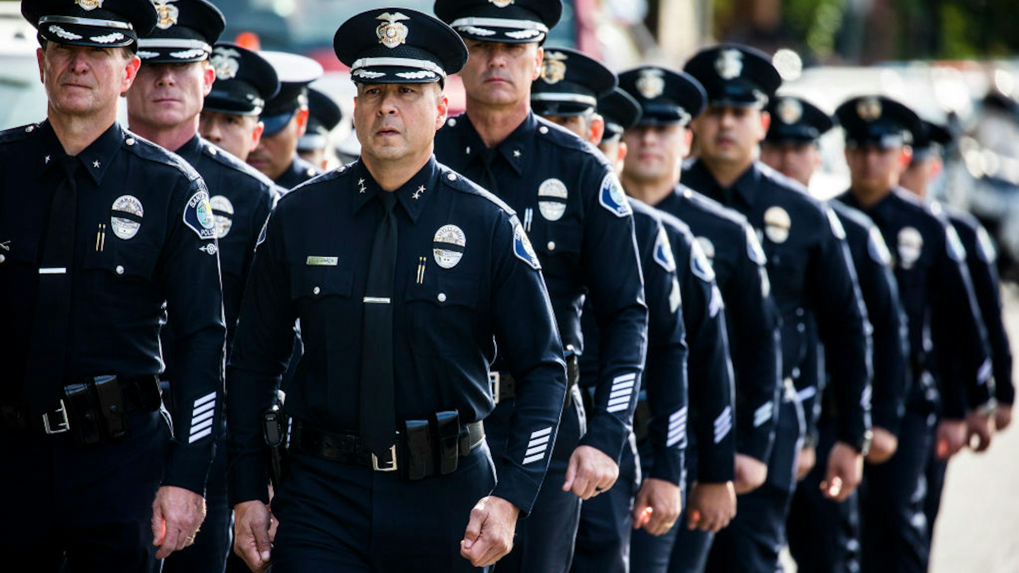 WESTLAKE VILLAGE, CA - NOVEMBER 15: Santa Ana Police Officers leave the service of Sgt. Ron Helus, who was killed Wednesday, Nov. 7, 2018, in a deadly shooting at a country music bar, the Borderline Bar and Grill in Thousand Oaks, Calif., following his memorial service at The Calvary Community Church, on November 15, 2018 in Westlake Village, California. Sgt. Helus was killed in a mass shooting at the Borderline Bar and Grill in Thousand Oaks, California on November 7. (Photo by Barbara Davidson/Getty Images)