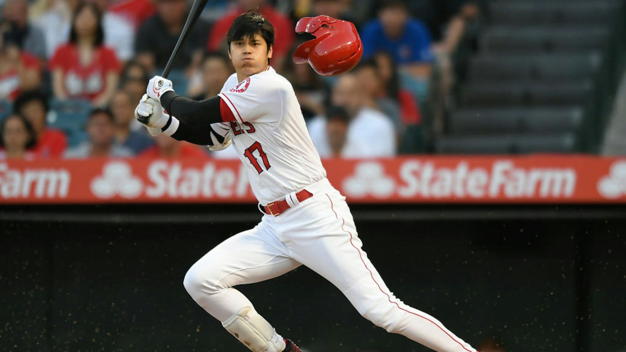 ANAHEIM, CA - JULY 15: Shohei Ohtani #17 of the Los Angeles Angels of Anaheim lost his helmet swinging at a pitch in the first inning against Houston Astrosat Angel Stadium of Anaheim on July 15, 2019 in Anaheim, California. (Photo by John McCoy/Getty Images)