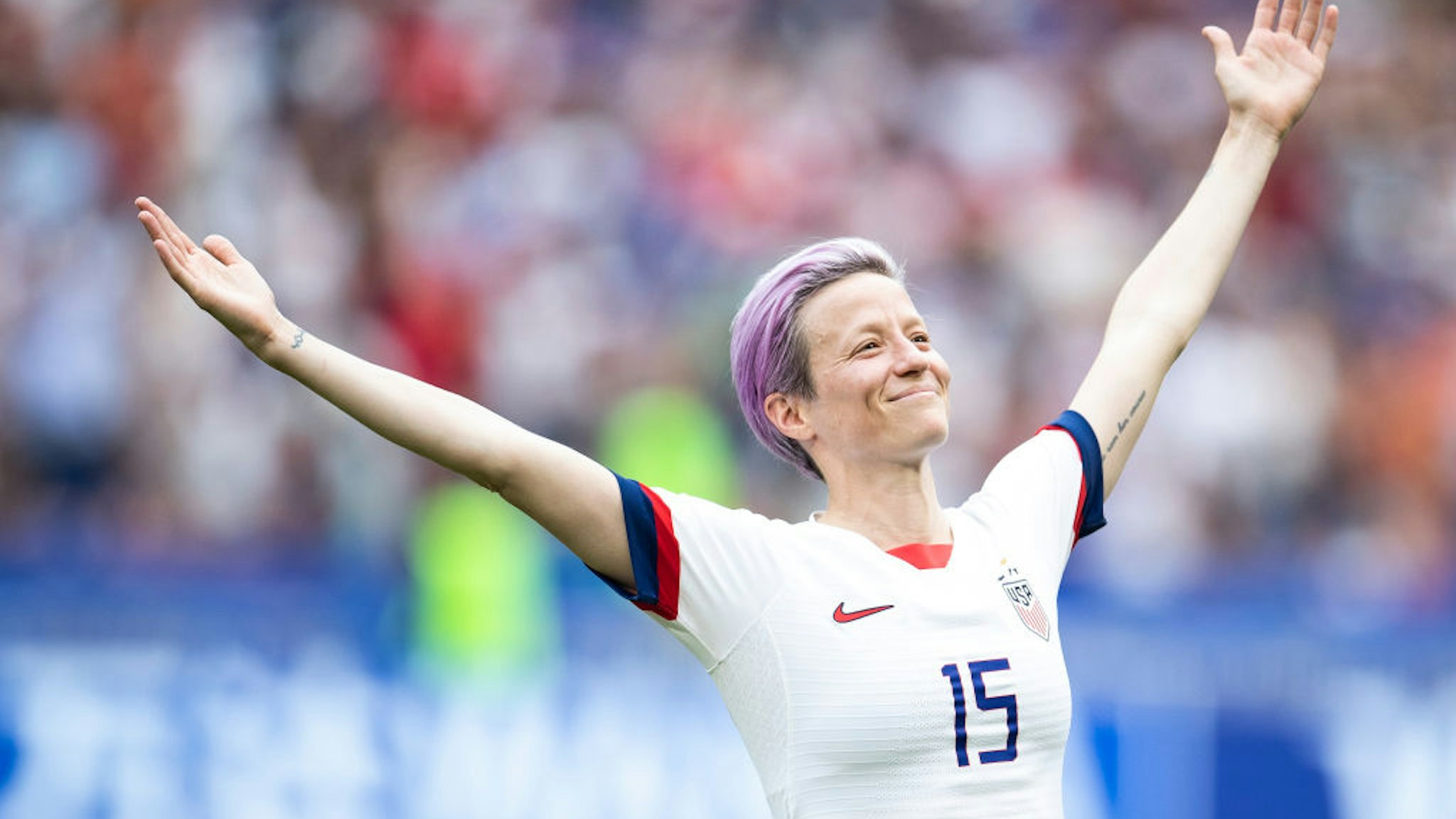 LYON, FRANCE - JULY 07: Megan Rapinoe of the USA celebrates following her sides victory in the 2019 FIFA Women's World Cup France Final match between The United States of America and The Netherlands at Stade de Lyon on July 07, 2019 in Lyon, France. (Photo by Maja Hitij/Getty Images)