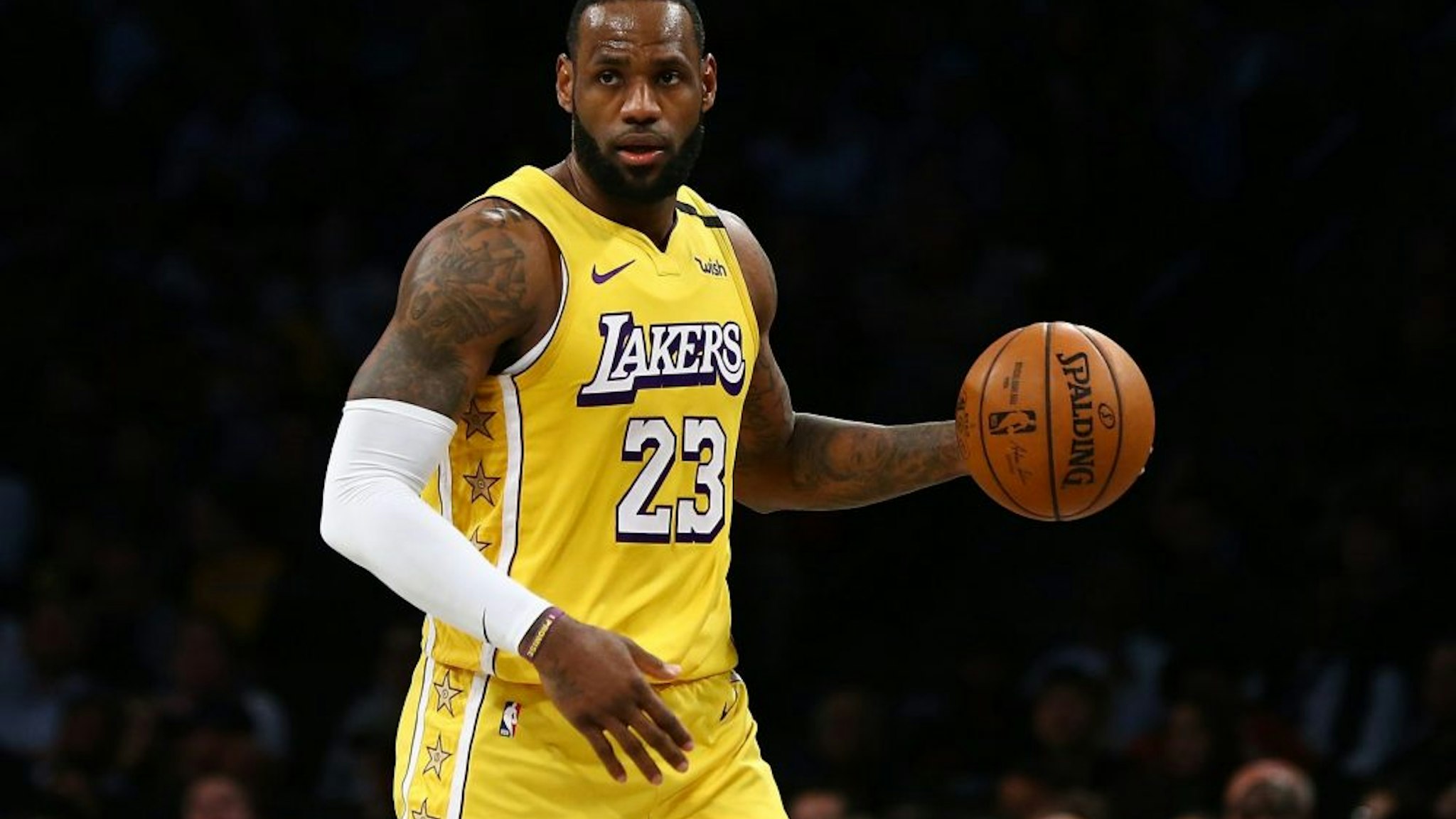 NEW YORK, NEW YORK - JANUARY 23: LeBron James #23 of the Los Angeles Lakers carries the ball against against the Brooklyn Nets at Barclays Center on January 23, 2020 in New York City. NOTE TO USER: User expressly acknowledges and agrees that, by downloading and or using this photograph, User is consenting to the terms and conditions of the Getty Images License Agreement.