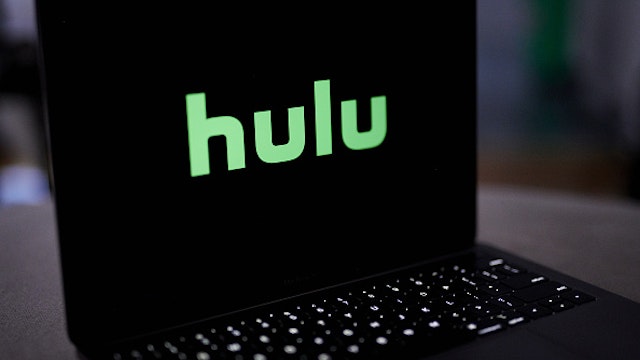 The Hulu logo on a laptop computer arranged in New York, U.S., on Wednesday, Nov. 18, 2020. Walt Disney Co.'s Hulu division is lifting the subscription cost of its live-TV service by 18% to $65 a month, in the latest sign that streaming-video providers are feeling comfortable raising prices for consumers.