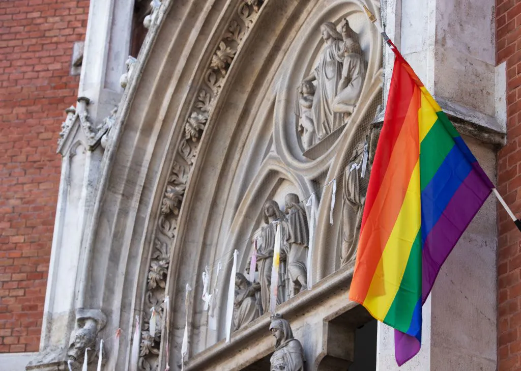 A LGBT rainbow flag hangs outside St Elizabeth Church in Wieden, Vienna, on March 25, 2021.