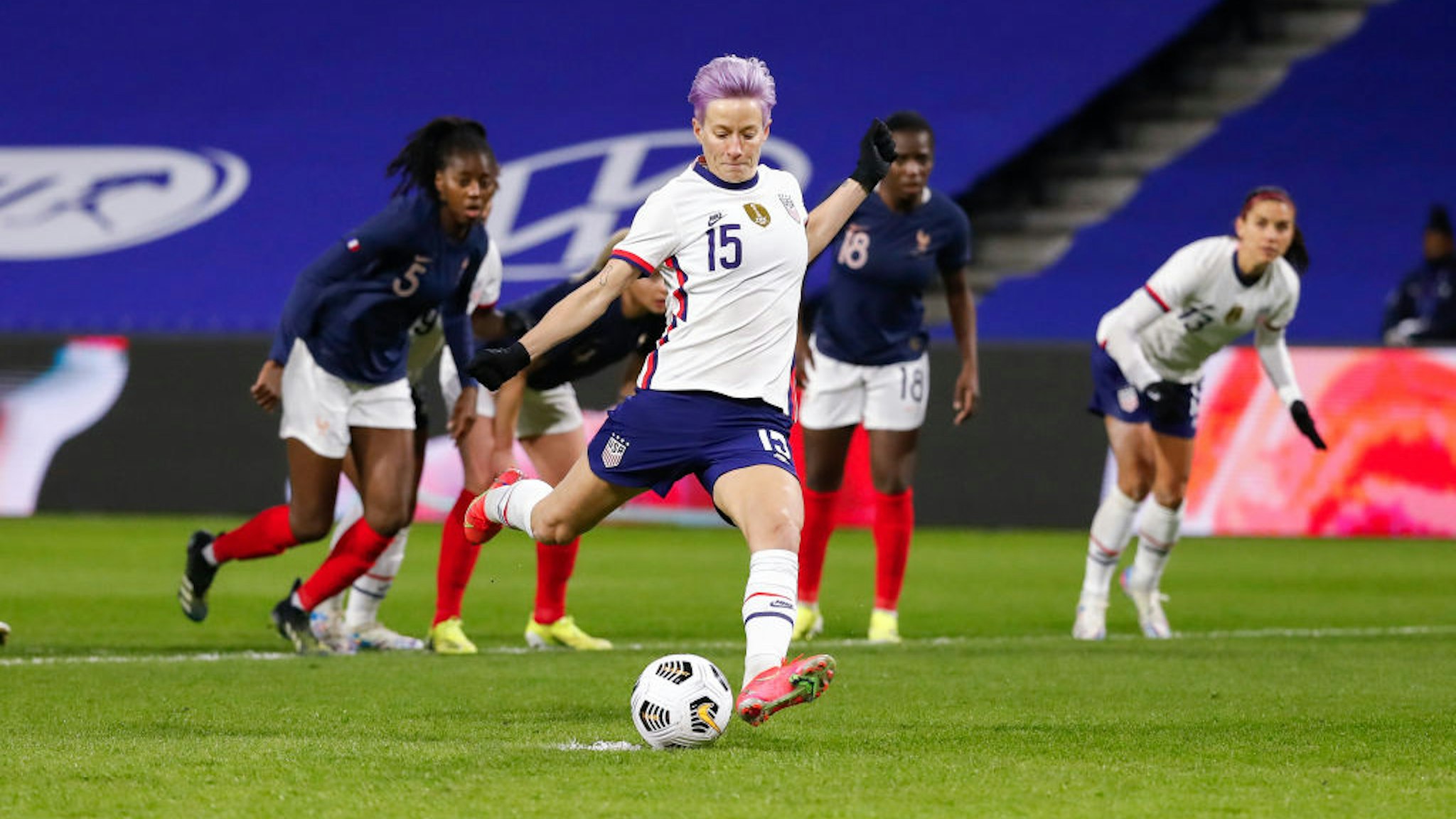 Megan Rapinoe #15 of USA shoots a penalty and scores during the International women friendly match between France and United States on April 13, 2021 in Le Havre, France.