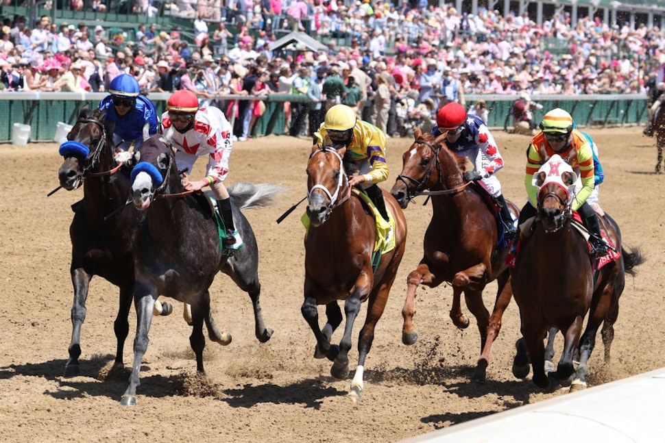 LOUISVILLE, KY - APRIL 30: Mayfield (6) ridden by Jose Ortiz on the far outside in the blue is the winner of the 18th running of The Alysheba during Oaks Day on April 30, 2021 at Churchill Downs in Louisville, Kentucky. (Photo by Brian Spurlock/Icon Sportswire via Getty Images)