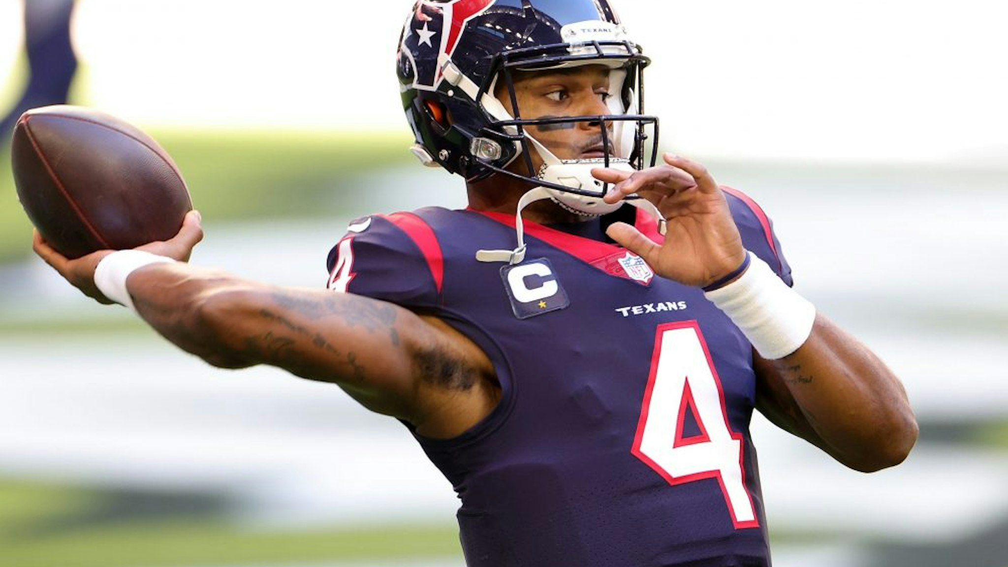 HOUSTON, TEXAS - JANUARY 03: Deshaun Watson #4 of the Houston Texans participates in warmups prior to a game against the Tennessee Titans at NRG Stadium on January 03, 2021 in Houston, Texas.