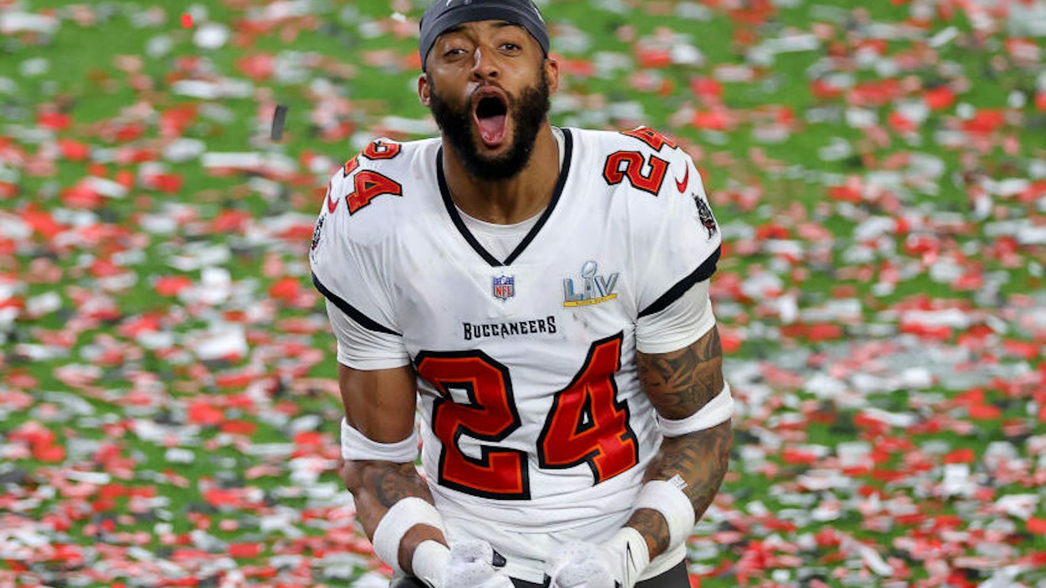 Carlton Davis #24 of the Tampa Bay Buccaneers reacts as confetti falls after defeating the Kansas City Chiefs in Super Bowl LV at Raymond James Stadium on February 07, 2021 in Tampa, Florida.