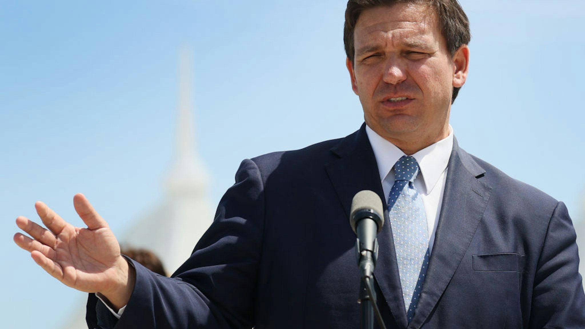 Florida Gov. Ron DeSantis speaks to the media about the cruise industry during a press conference at PortMiami on April 08, 2021 in Miami, Florida.
