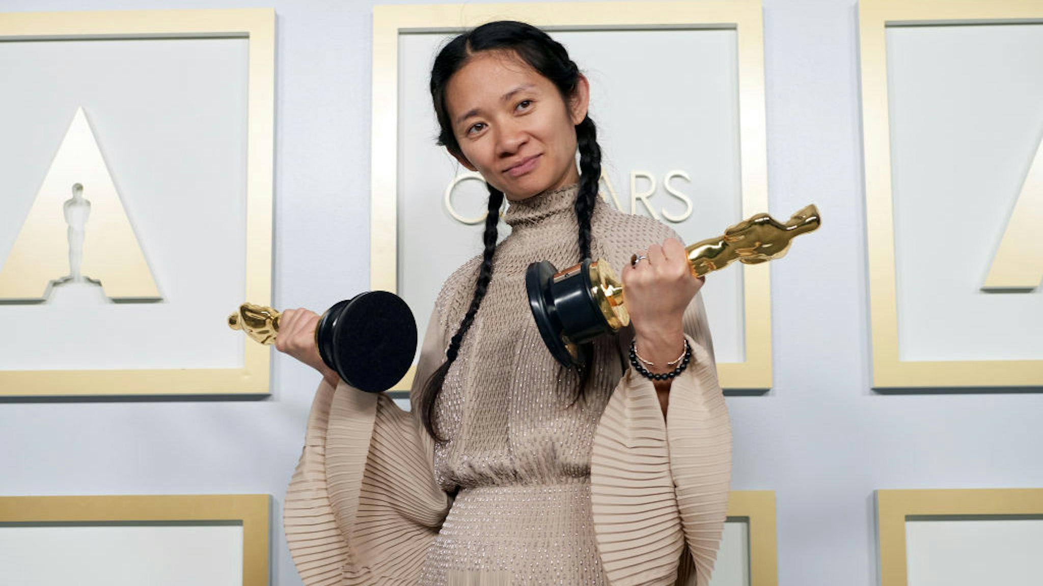 LOS ANGELES, CALIFORNIA – APRIL 25: (EDITORIAL USE ONLY) In this handout photo provided by A.M.P.A.S., Chloé Zhao, winner of the Best Director for 'Nomadland,' poses in the press room during the 93rd Annual Academy Awards at Union Station on April 25, 2021 in Los Angeles, California. (Photo by Matt Petit/A.M.P.A.S. via Getty Images)