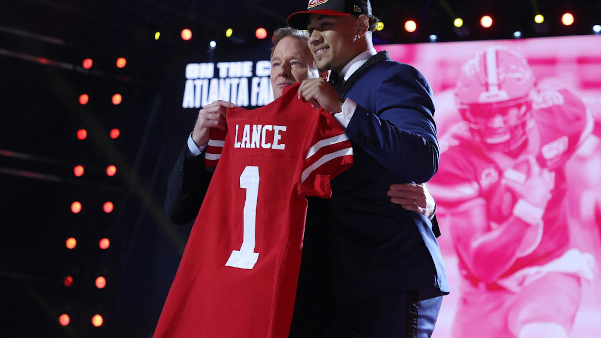 CLEVELAND, OHIO - APRIL 29: Trey Lance poses with NFL Commissioner Roger Goodell onstage after being selected third by the San Francisco 49ers during round one of the 2021 NFL Draft at the Great Lakes Science Center on April 29, 2021 in Cleveland, Ohio. (Photo by Gregory Shamus/Getty Images)