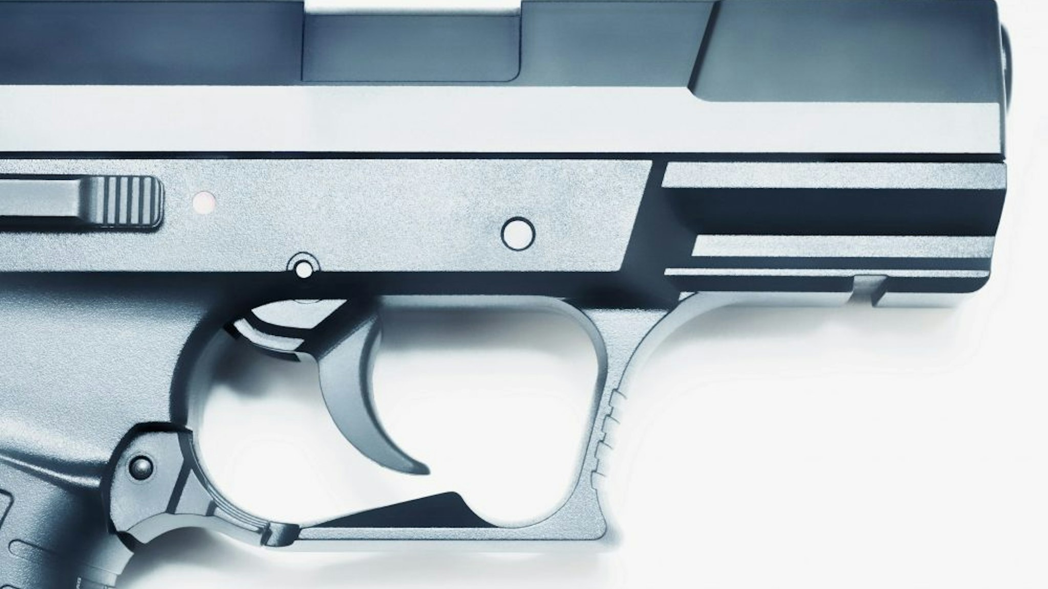 Close-up of trigger and barrel of a handgun