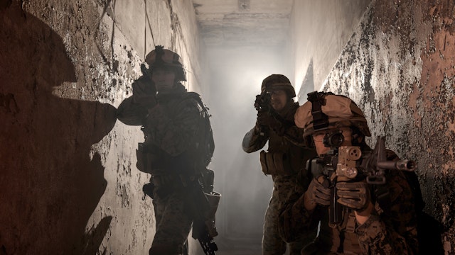 Three U.S. Marines involved in the raid. - stock photo