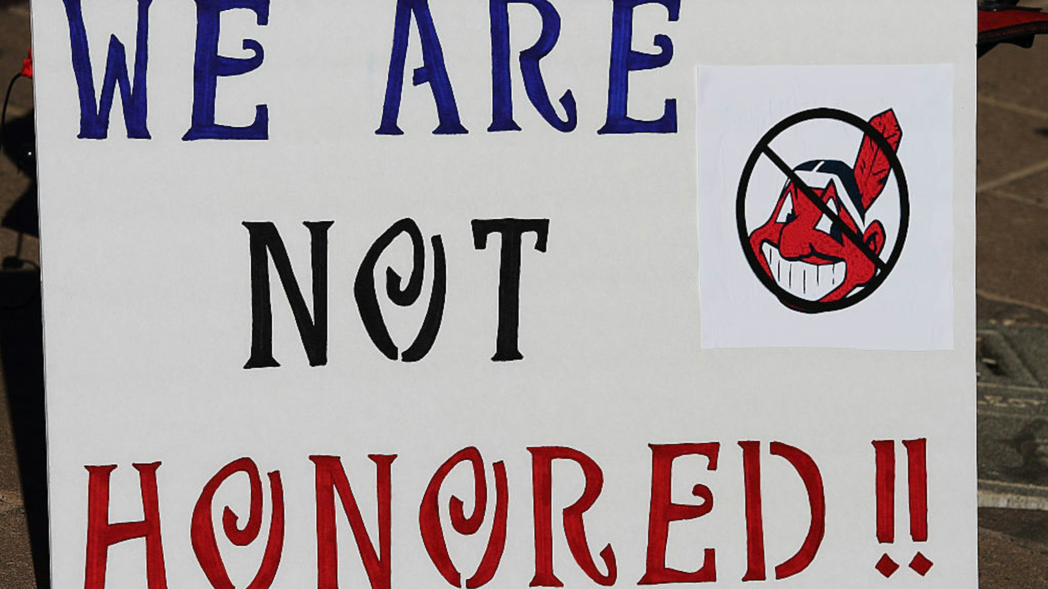 Jun 25, 2014: Native Americans protest the use of the Chief Wahoo mascot by the Cleveland Indians Major League Baseball team outside a regular season game between the Cleveland Indians and the Arizona Diamondbacks at Chase Field.
