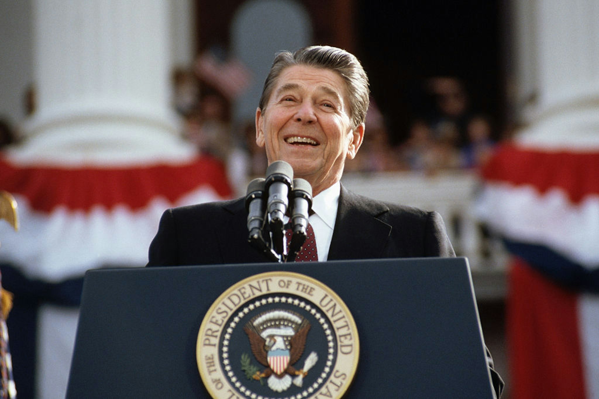 President Ronald Reagan, campaigning for a second term of office, smiles during a rally speech at the California State Capitol the day before the 1984 presidential election. (Photo by © Wally McNamee/CORBIS/Corbis via Getty Images)