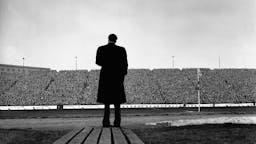 The American evangelist Billy Graham addresses a huge crowd at half time in a match between Chelsea and Newcastle at Stamford Bridge The American evangelist Billy Graham addresses a huge crowd at half time in a match between Chelsea and Newcastle at Stamford Bridge
