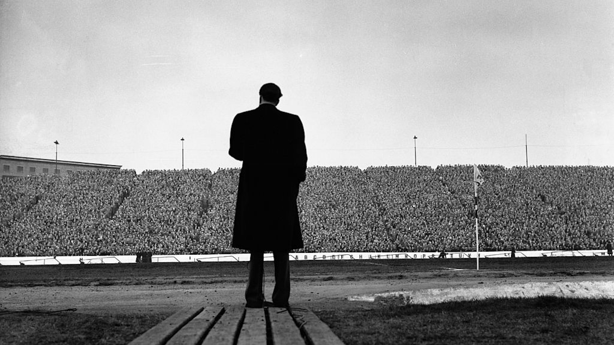 The American evangelist Billy Graham addresses a huge crowd at half time in a match between Chelsea and Newcastle at Stamford Bridge