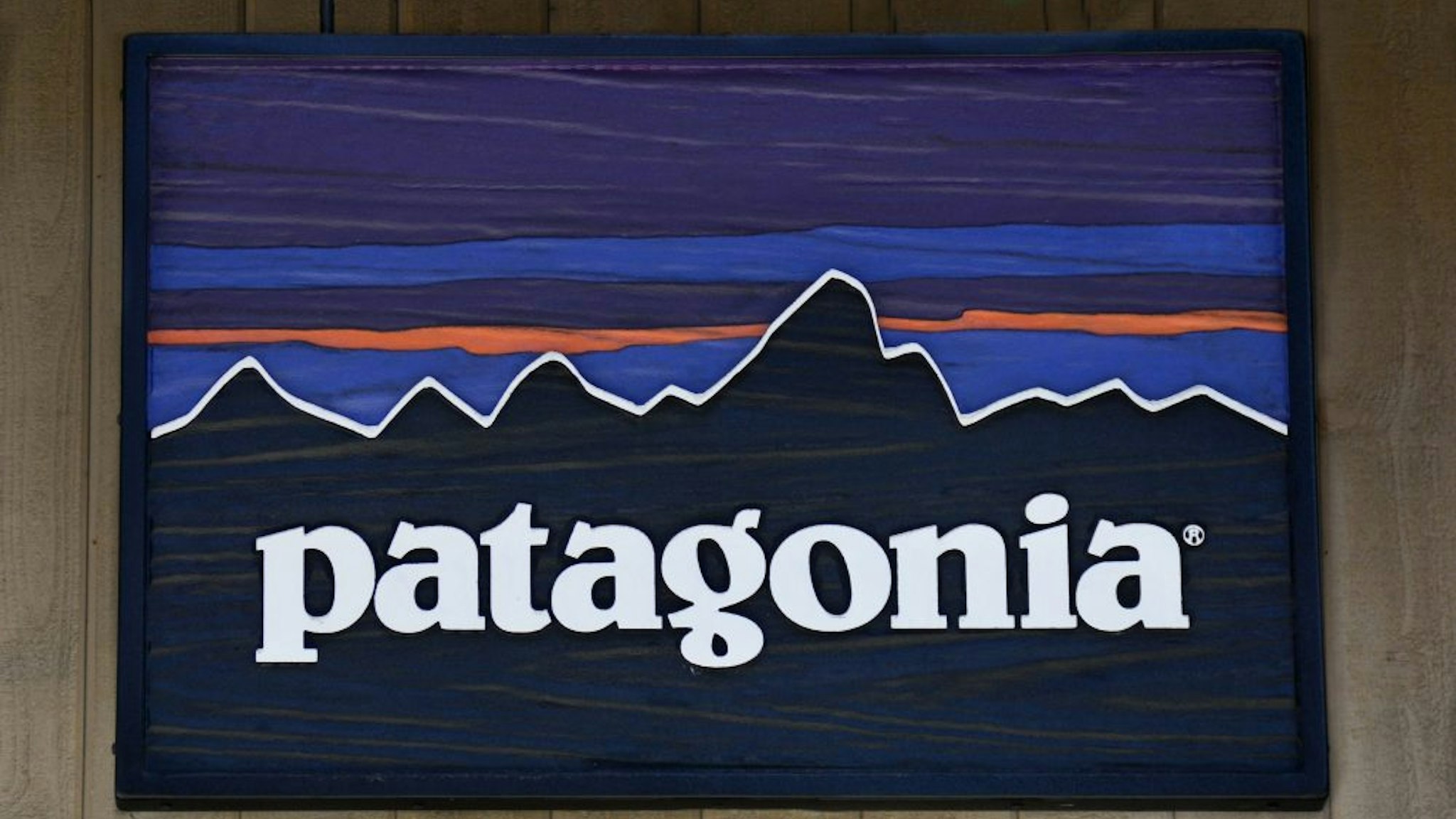 VAIL, CO - JUNE 9, 2017: A sign hangs over the entrance to the Patagonia outdoor clothing shop in Vail, Colorado. The retail chain is based in Ventura, California.