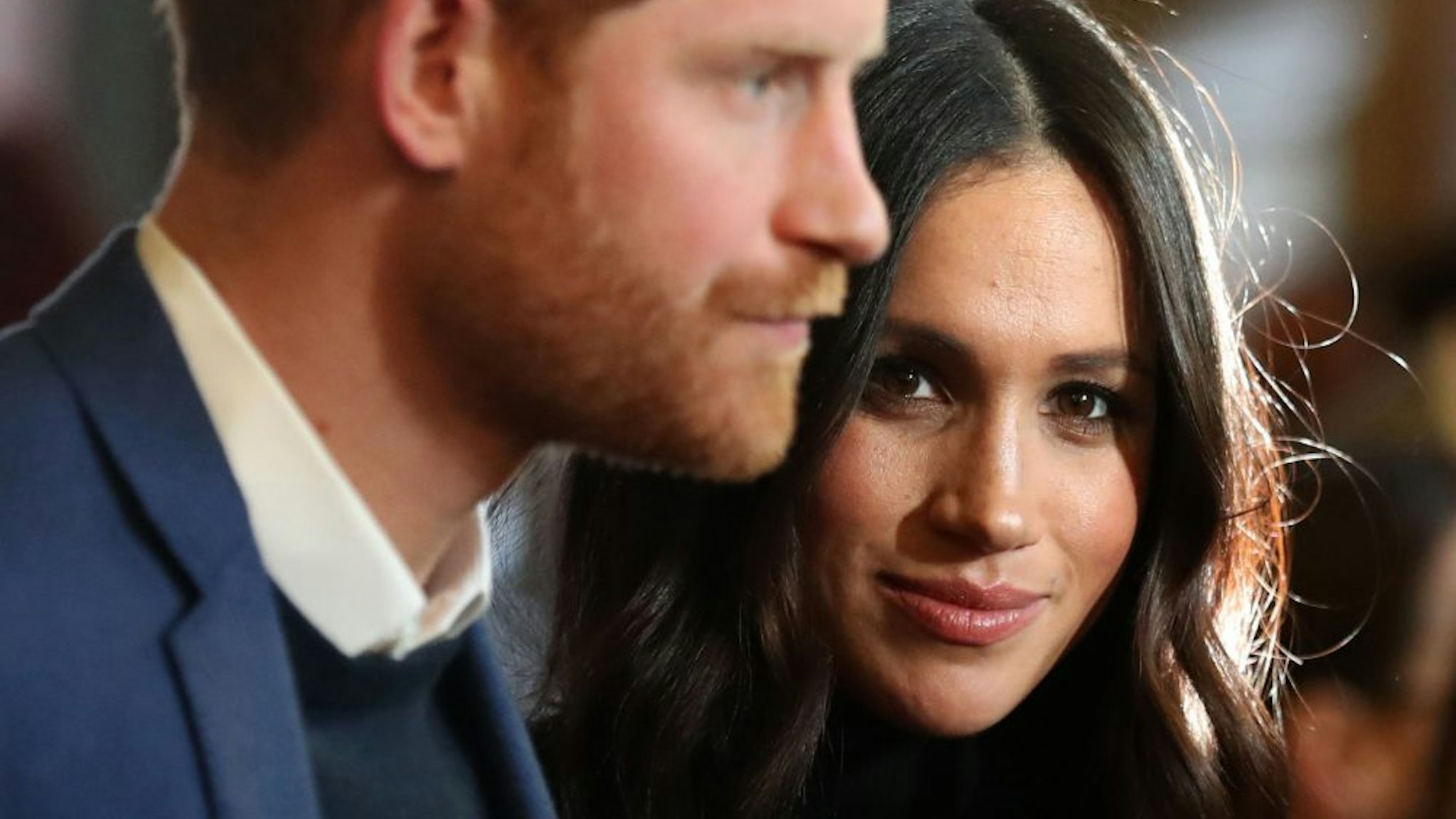 EDINBURGH, SCOTLAND - FEBRUARY 13: Prince Harry and Meghan Markle attend a reception for young people at the Palace of Holyroodhouse on February 13, 2018 in Edinburgh, Scotland.