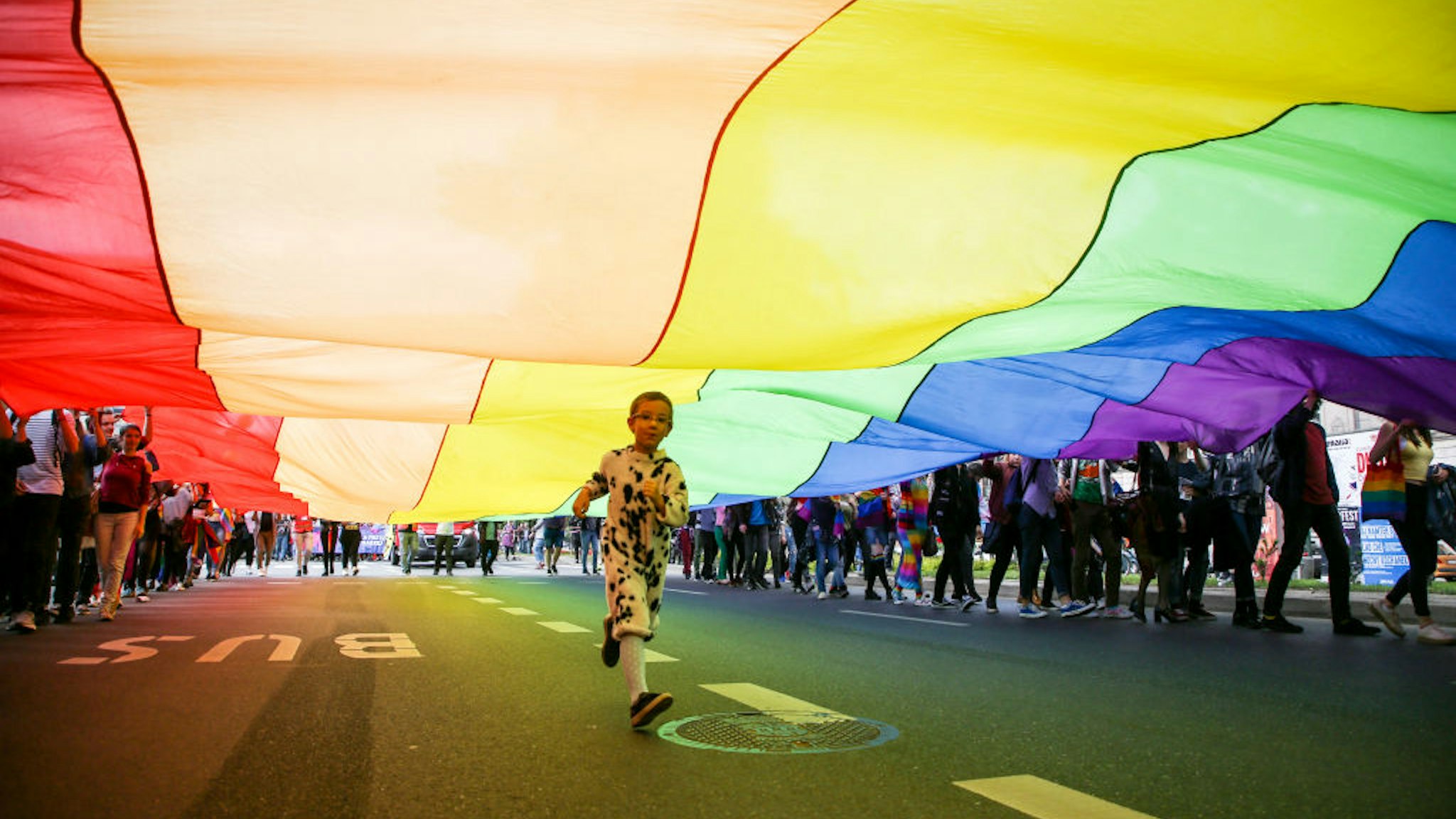 People attend the Equality March in Krakow, Poland on 19 May, 2018. LGBT people and their supporters walk through the streets of Krakow to celebrate diversity and tolerance and express their opposition to discrimination and exclusion. (Photo by Beata Zawrzel/NurPhoto via Getty Images)