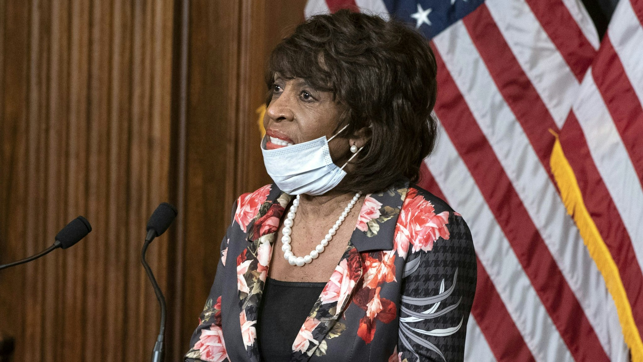 Representative Maxine Waters, a Democrat from California, speaks while participating in a signing ceremony of H.R. 266, The Paycheck Protection Program and Health Care Enhancement Act, in the Rayburn Room of the U.S. Capitol in Washington, D.C., U.S., on Thursday, April 23, 2020. The House overwhelmingly passed and sent to President Donald Trump a $484 billion coronavirus aid package, even as members are already at odds over the next phase of rescue legislation.