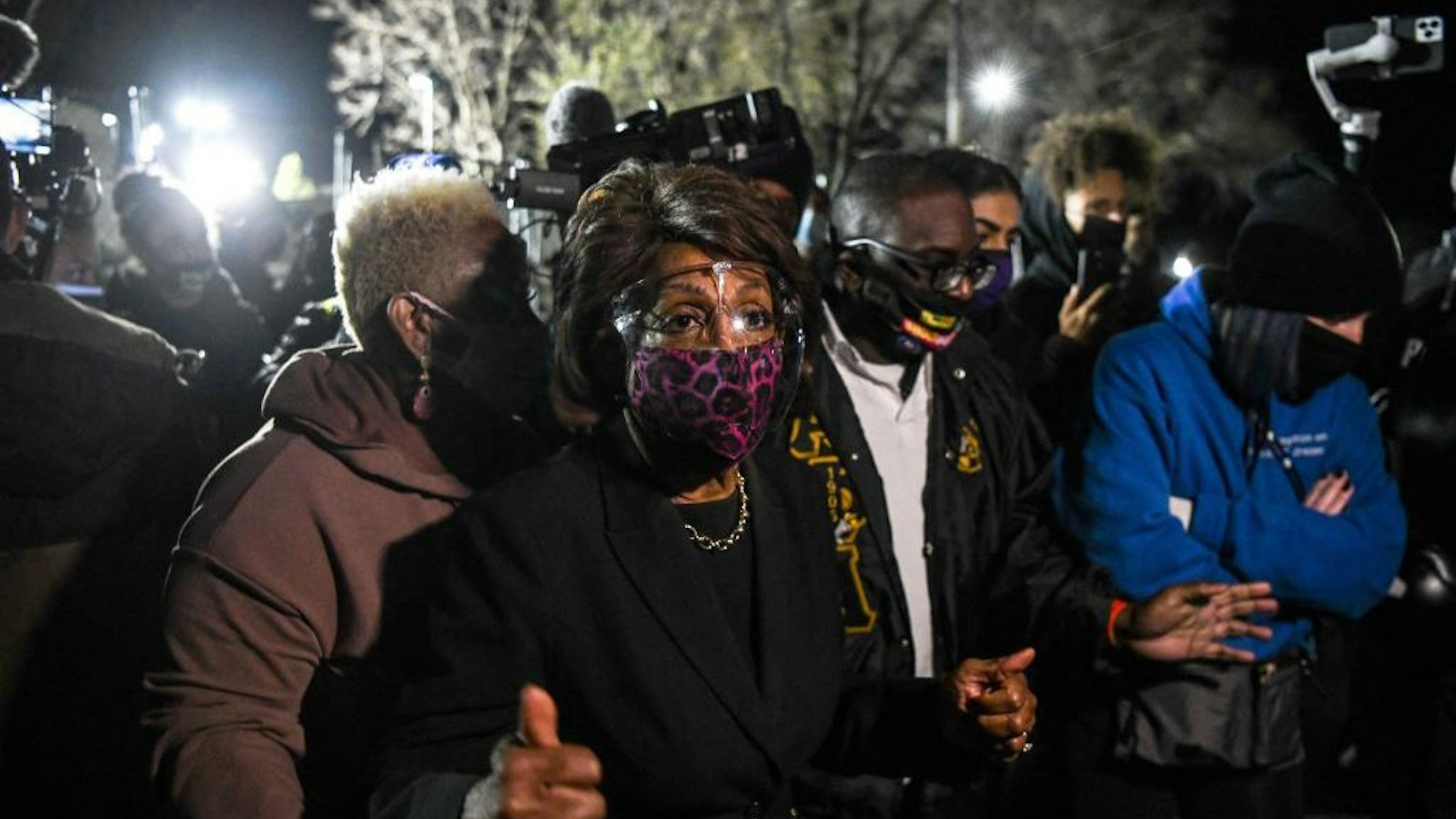 Representative Maxine Waters(C) (D-CA) speaks to the media during an ongoing protest at the Brooklyn Center Police Department in Brooklyn Centre, Minnesota on April 17, 2021. - Police officer, Kim Potter, who shot dead Black 20-year-old Daunte Wright in a Minneapolis suburb after appearing to mistake her gun for her Taser was arrested April 14 on manslaughter charges. (Photo by CHANDAN KHANNA / AFP) (Photo by CHANDAN KHANNA/AFP via Getty Images)