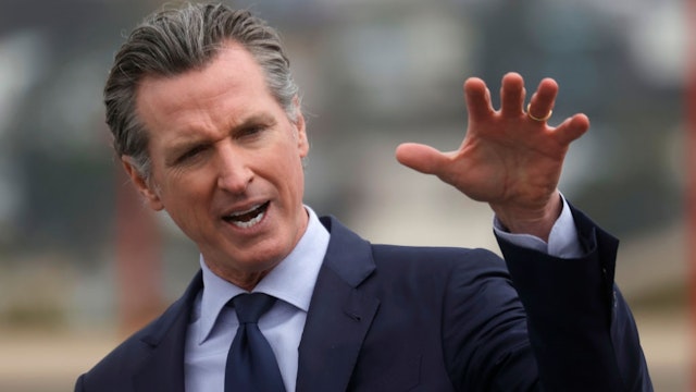 SAN FRANCISCO, CALIFORNIA - APRIL 06: California Gov. Gavin Newsom speaks during a news conference after touring the vaccination clinic at City College of San Francisco on April 06, 2021 in San Francisco, California.