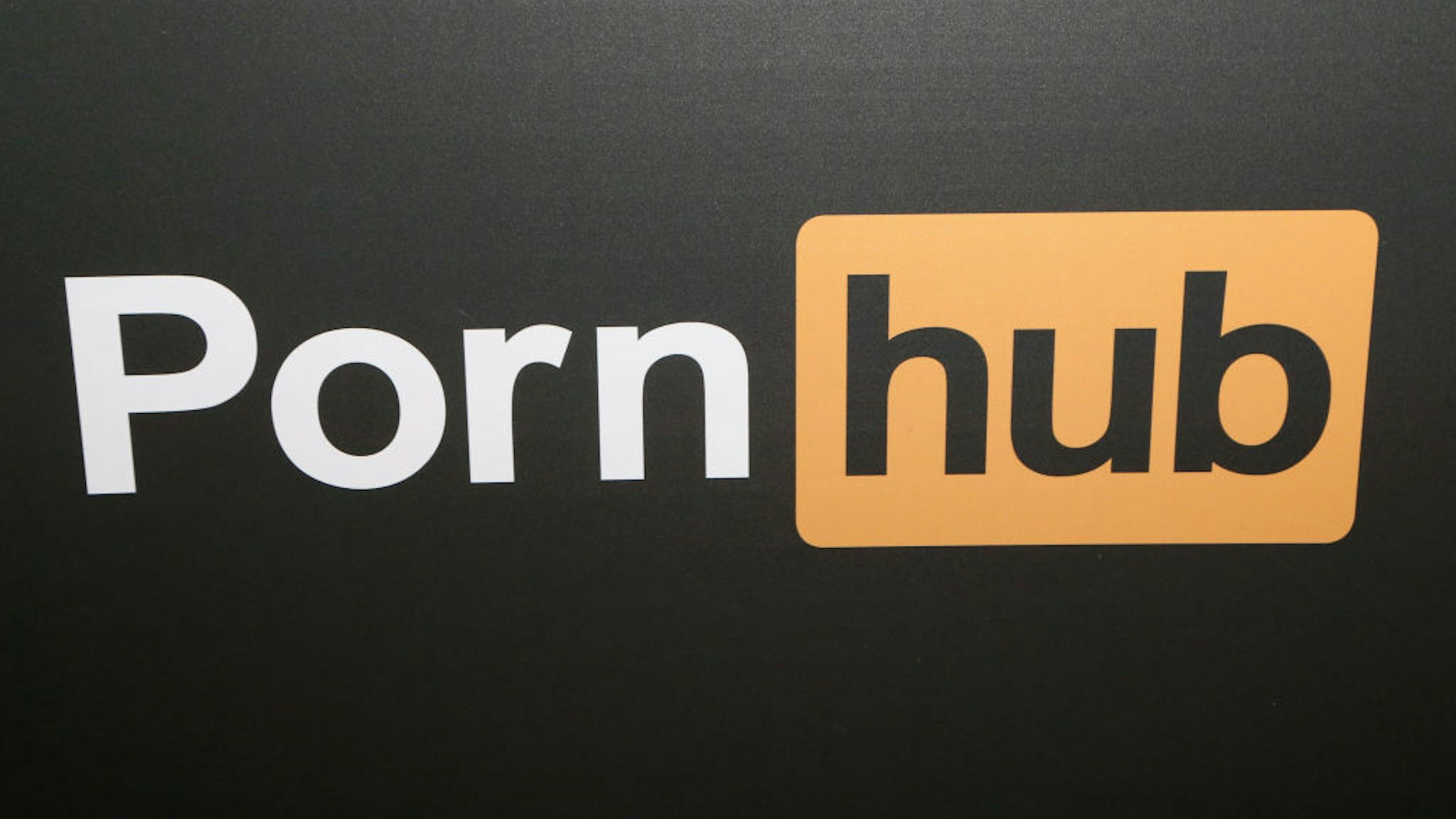 LAS VEGAS, NV - JANUARY 25: A Pornhub logo is displayed at the company's booth during the 2018 AVN Adult Expo at the Hard Rock Hotel &amp; Casino on January 25, 2018 in Las Vegas, Nevada. (Photo by Gabe Ginsberg/FilmMagic)
